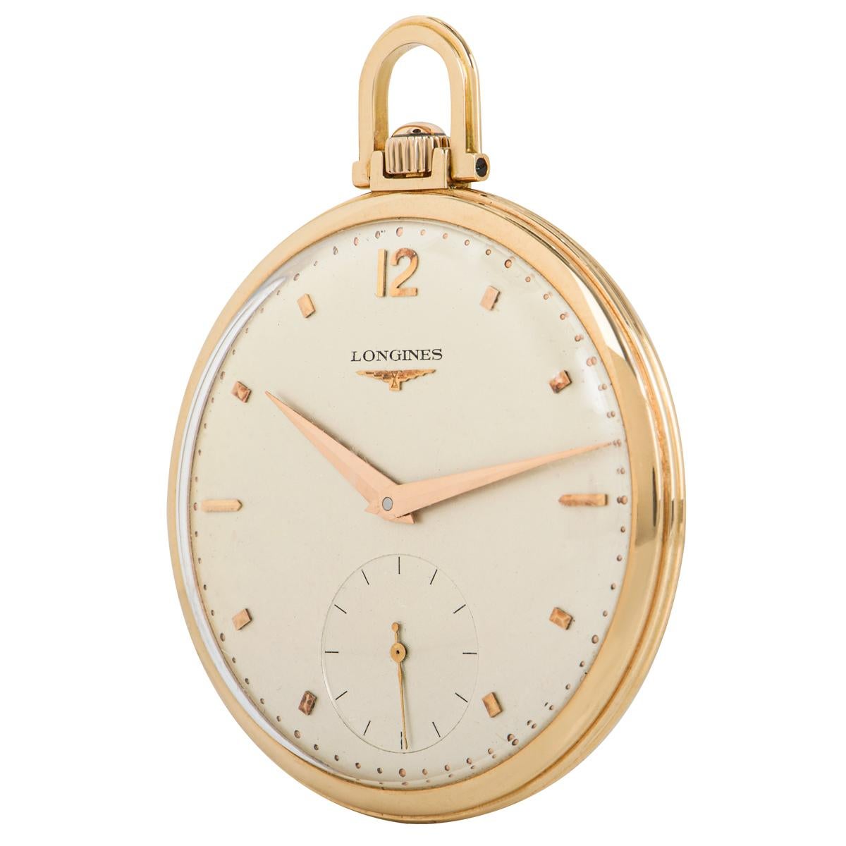 Longines 18ct Rose Gold Open Face Keyless Lever Gentleman's Dress Pocket Watch C1920.

Dial: The beautiful original silver dial fully signed Longines with rose gold markers, Arabic number twelve and original rose gold Dauphine hands.

Case: The very