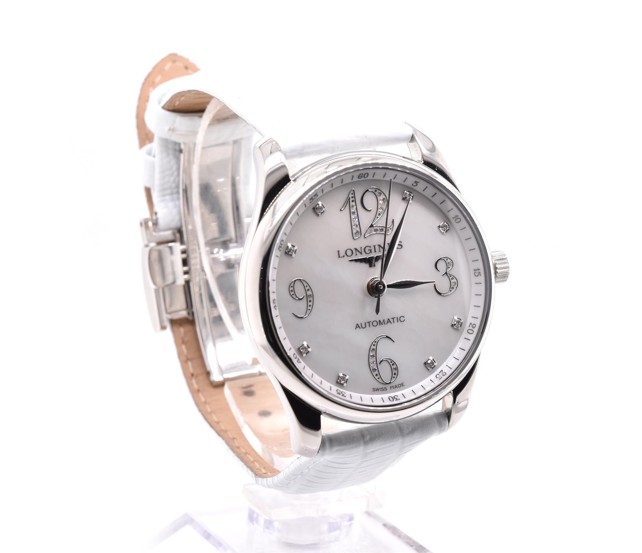 Brand: Longines
Movement: automatic
Function: hours, minutes, seconds
Case: 36mm case, smooth bezel, sapphire crystal
Dial: mother-of-pearl diamond dial
Band: generic white lizard strap with factory Longines buckle, will fit up to a 7-inch