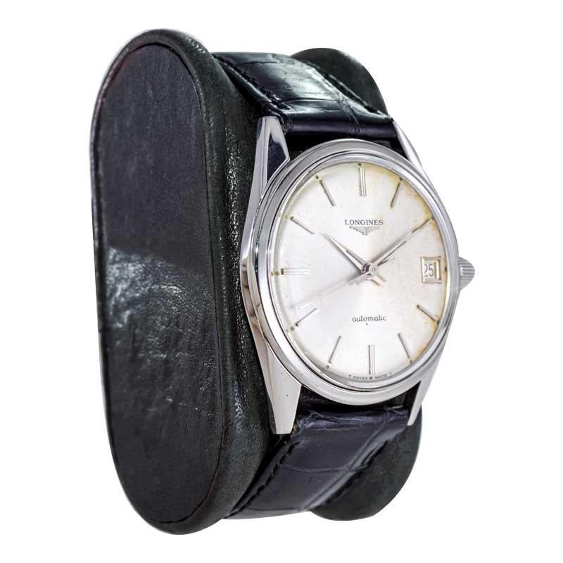 FACTORY / HOUSE: Longines Watch Company
STYLE / REFERENCE: Round 
METAL / MATERIAL: Stainless Steel
CIRCA / YEAR: 1960's
DIMENSIONS / SIZE: Length 41mm X Diameter 35mm
MOVEMENT / CALIBER: Automatic Winding / 24 Jewels 
DIAL / HANDS: Original