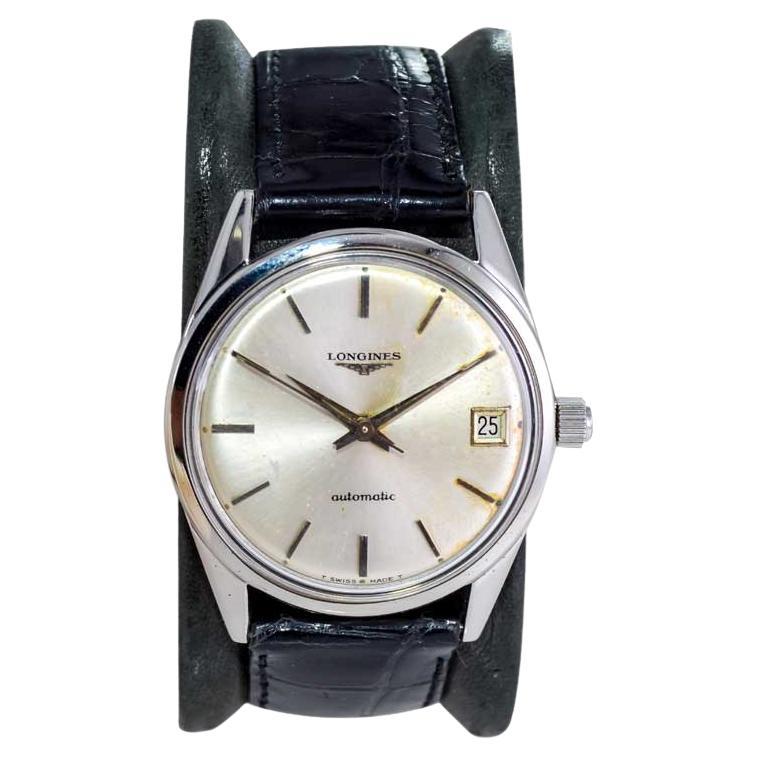 Longines Steel Mid Century Automatic with Original Dial circa 1960's For Sale