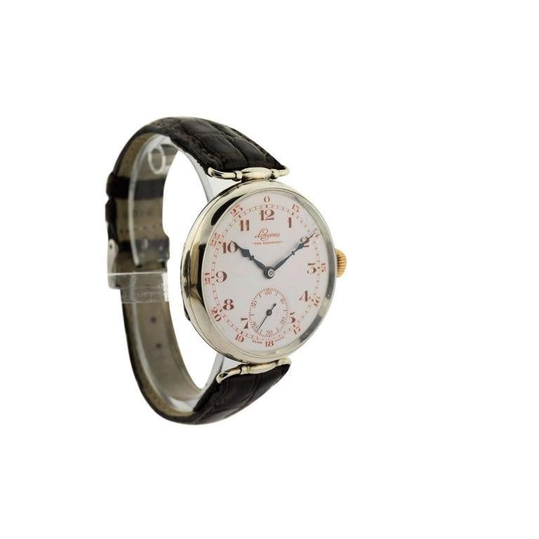 FACTORY / HOUSE: Longines Watch Company
STYLE / REFERENCE: Campaign Military / The Brighton
METAL / MATERIAL: Sterling Silver
CIRCA: 1928
DIMENSIONS: 50mm X 40mm
MOVEMENT / CALIBER: Manual Winding / 15 Jewels 
DIAL / HANDS: Original Kiln Fired