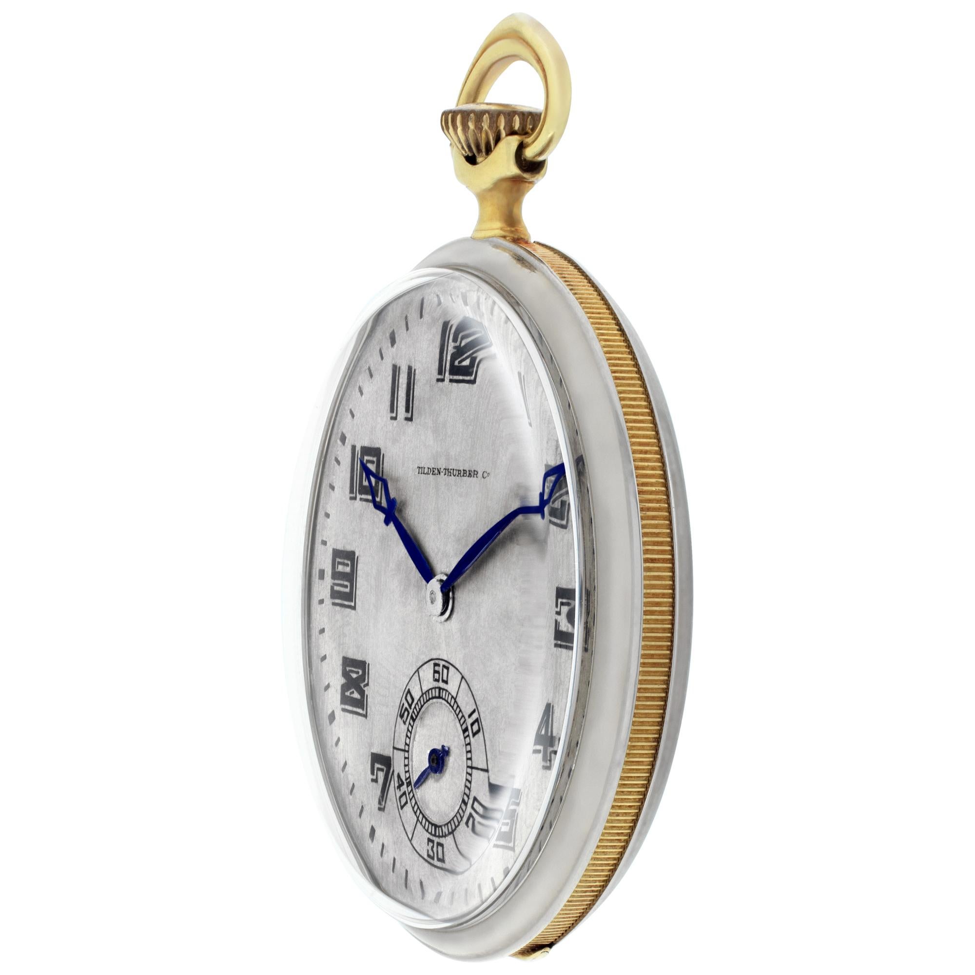 Tilden Thurber pocket watch in 18k yellow & white gold. Manual wind Longines movement w/ sub-seconds. High-grade, thin profile. Fine Pre-owned Longines Watch. Certified preowned Vintage Longines Tilden Tur watch is made out of white gold. This