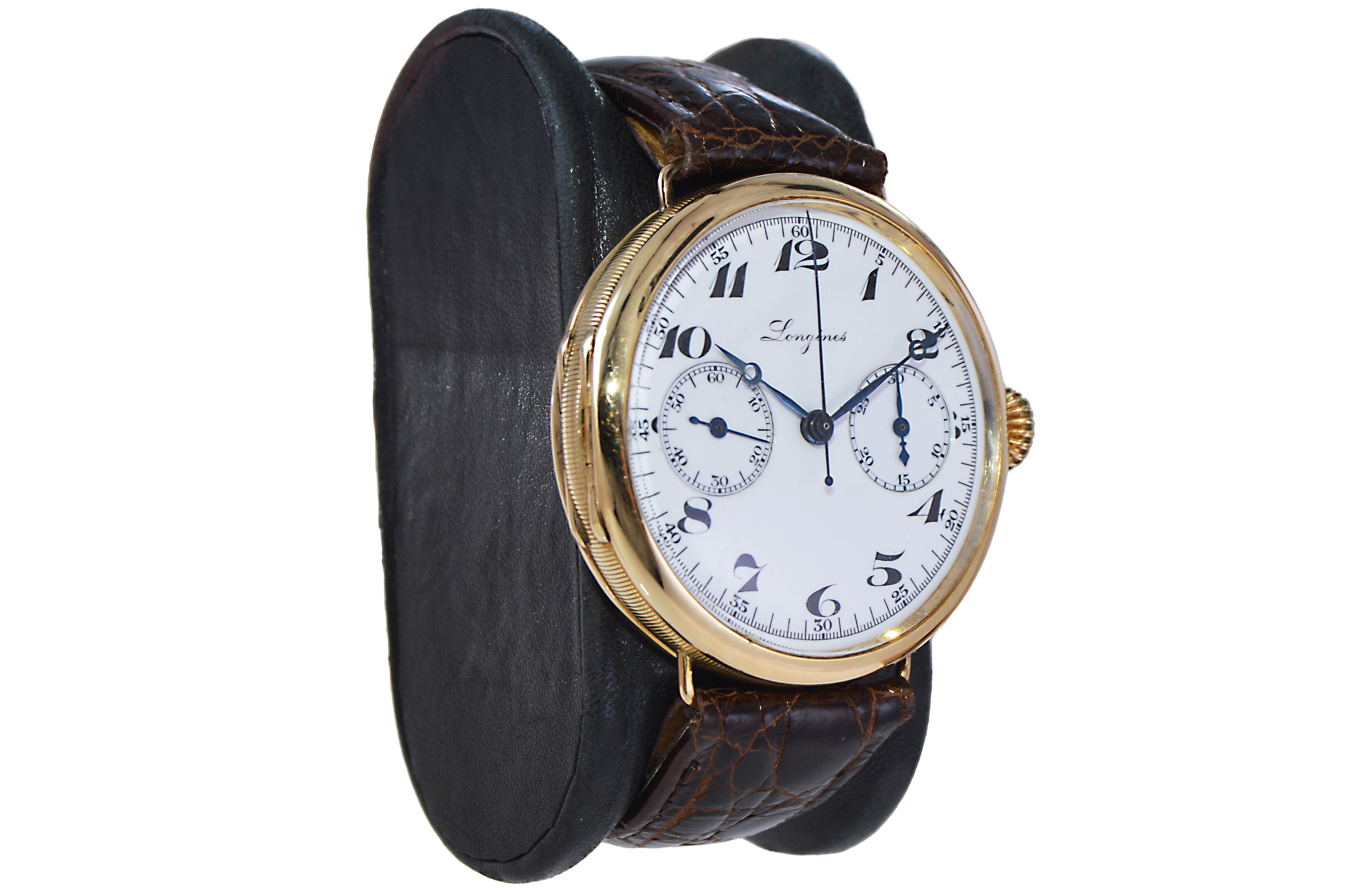 FACTORY / HOUSE: Longines Watch Company
STYLE / REFERENCE: Campaign Style / Chronograph
METAL / MATERIAL: 14 Kt. Solid Gold 
DIMENSIONS: Length 41mm X Diameter 39mm
CIRCA / YEAR: 1933 
MOVEMENT / CALIBER: Manual Winding / 17 Jewels  
DIAL / HANDS: