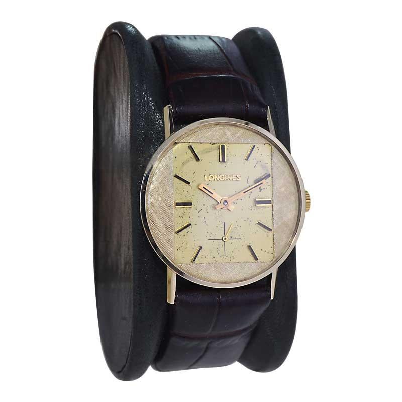 FACTORY / HOUSE: Longines Watch Company
STYLE / REFERENCE: Modernist Design
METAL / MATERIAL: Yellow Gold Filled 
CIRCA / YEAR: 1960's
DIMENSIONS / SIZE: Length 36mm x Diameter 30mm
MOVEMENT / CALIBER: Manual Winding / 17 Jewels / Caliber 370 
DIAL