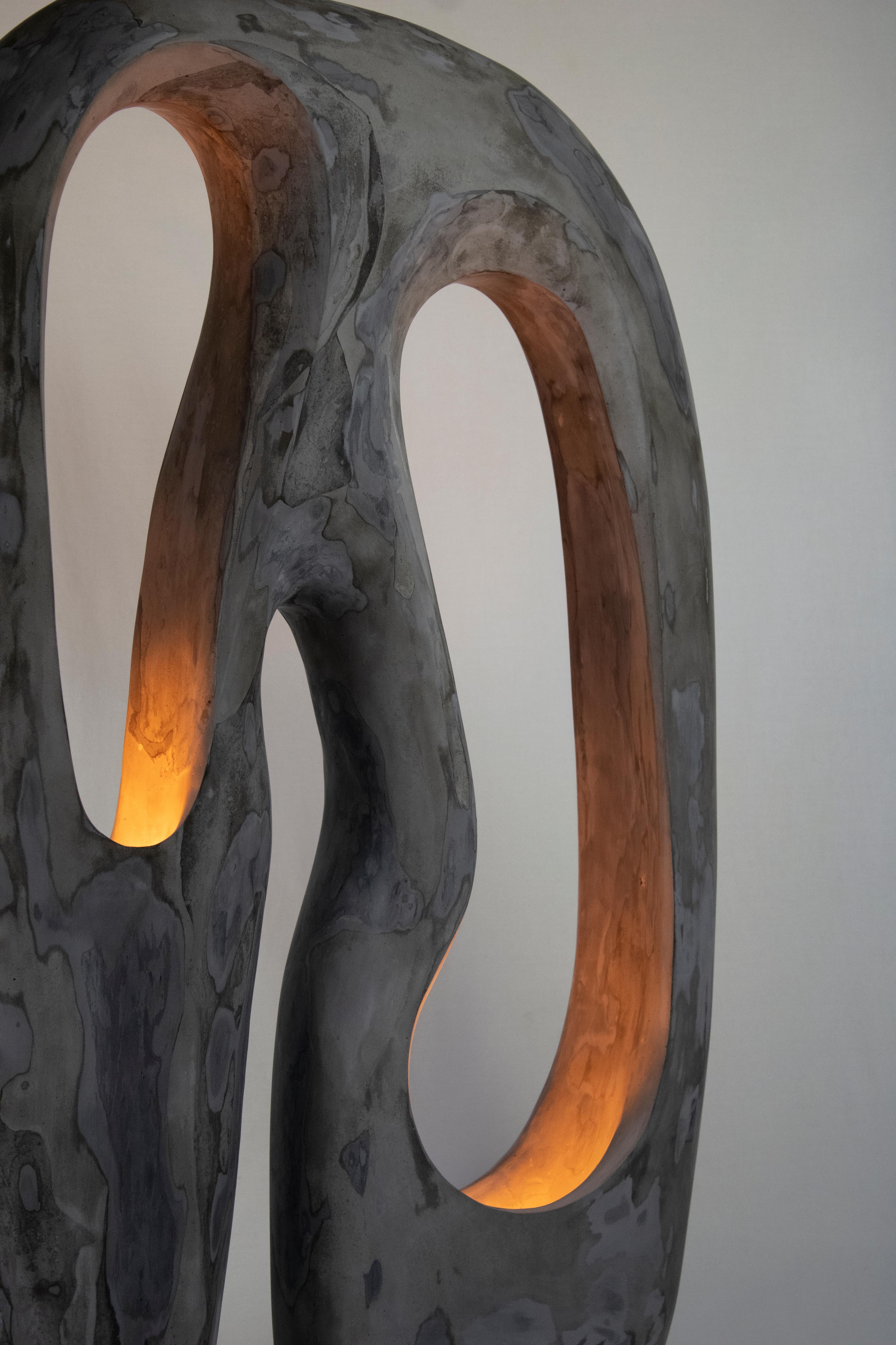 The Longing Lamp is a contemporary handmade sculptural gypsum lamp part of the Living Forms collection. The lamp is cast in gypsum and carved by hand. The Longing Lamp stands out as a stunning blend of fine art and functional design. It's a part of
