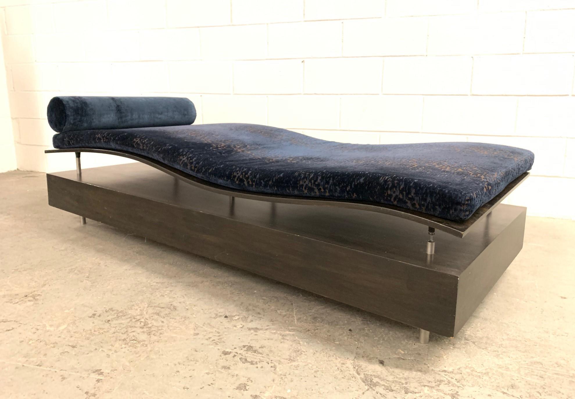 Longitude chaise lounge designed by Maya Lin for Knoll. This chaise is the from the Earth is (not) flat series for Knoll International, 1998. Original upholstery fabric with an attached headrest. It has a wood and metal frame and a contoured