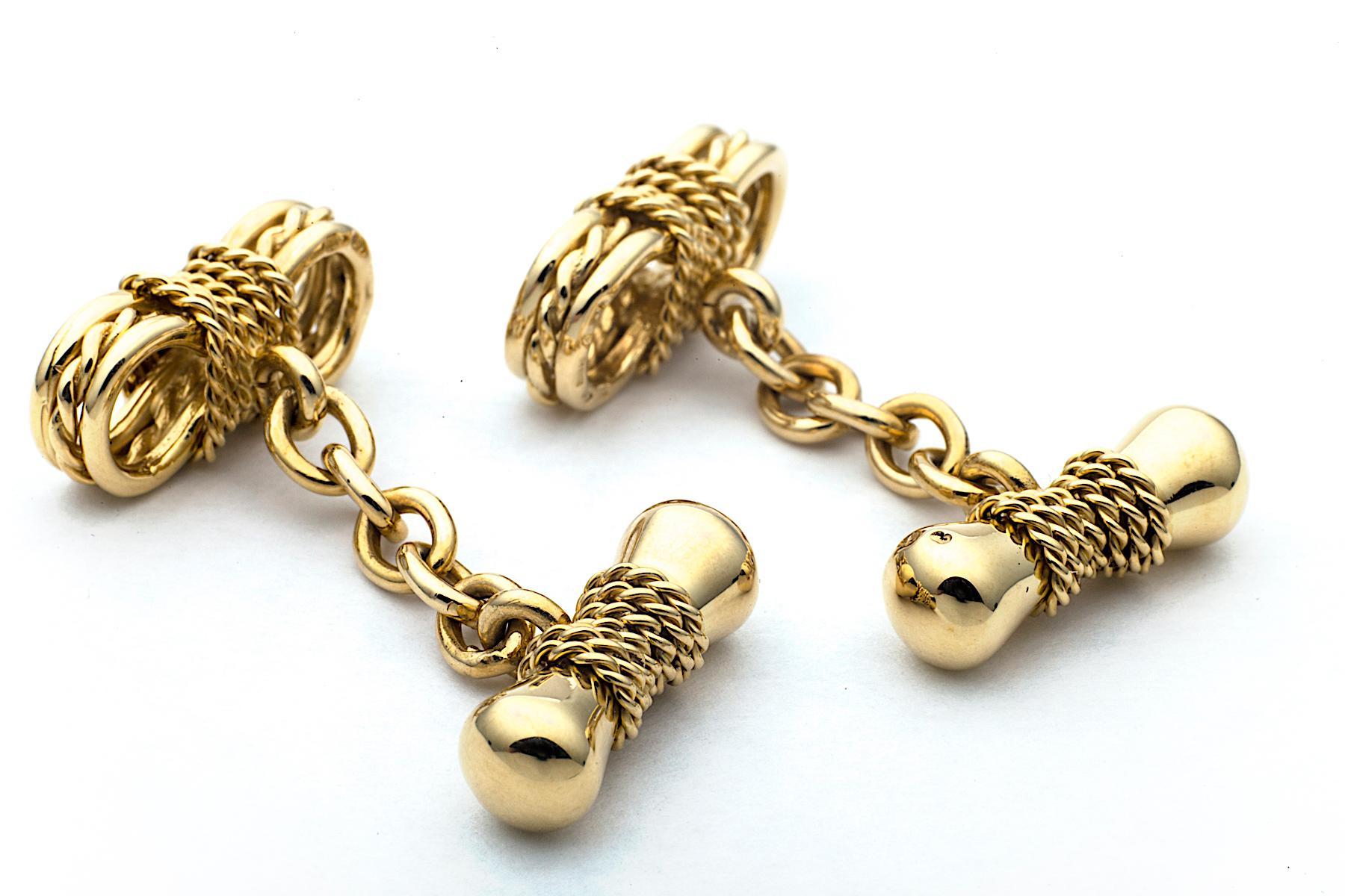 It will always be anchors away when wearing these vintage Longmire London 18 karat yellow gold cufflinks.  With wrapped and twisted rope detailing, these nautically inspired cufflinks guarantee smooth sailing.  Circa 1988.  Chain link connections. 