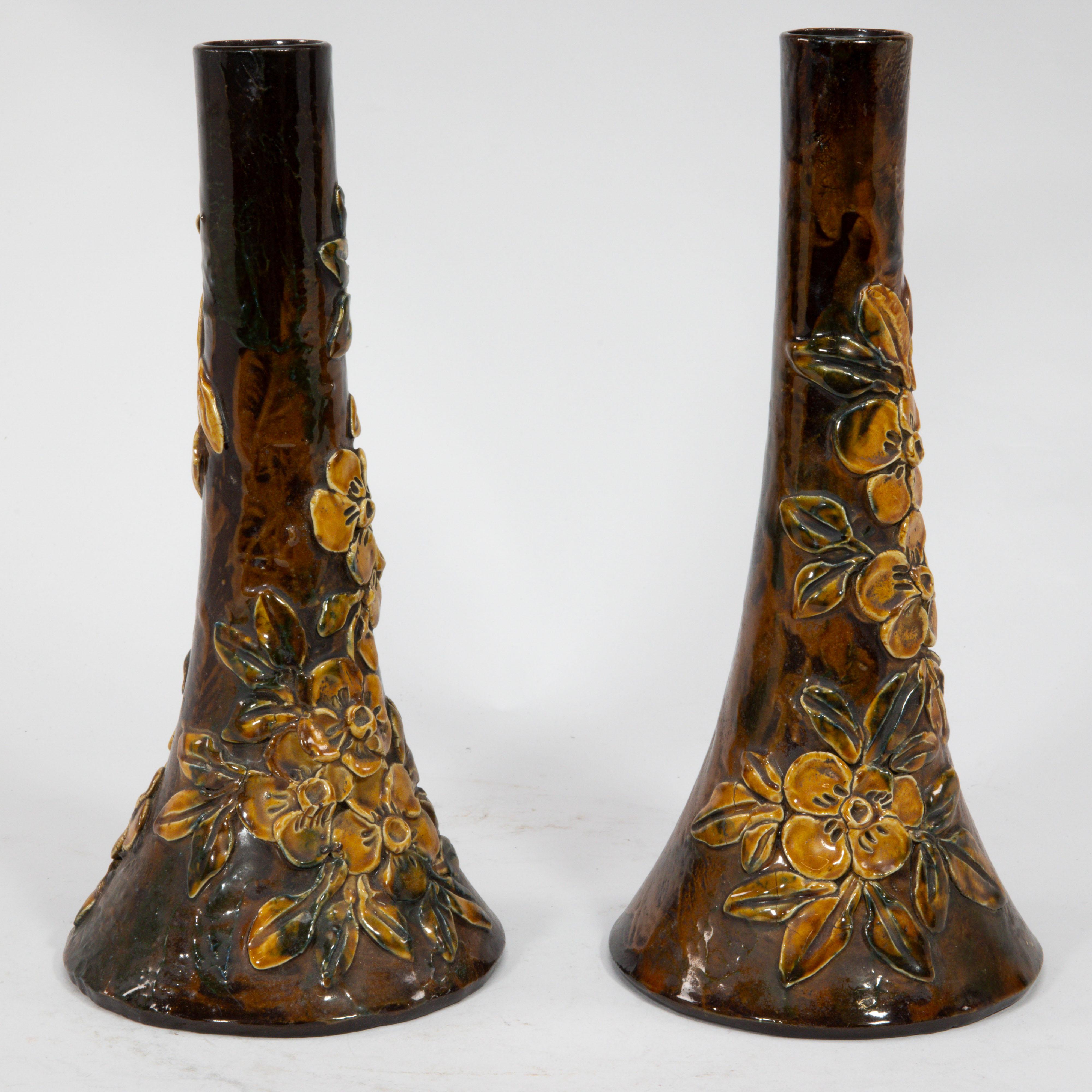 Early 20th Century Longpark Pottery. A pair of rustic ceramic vases with applied floral decoration For Sale