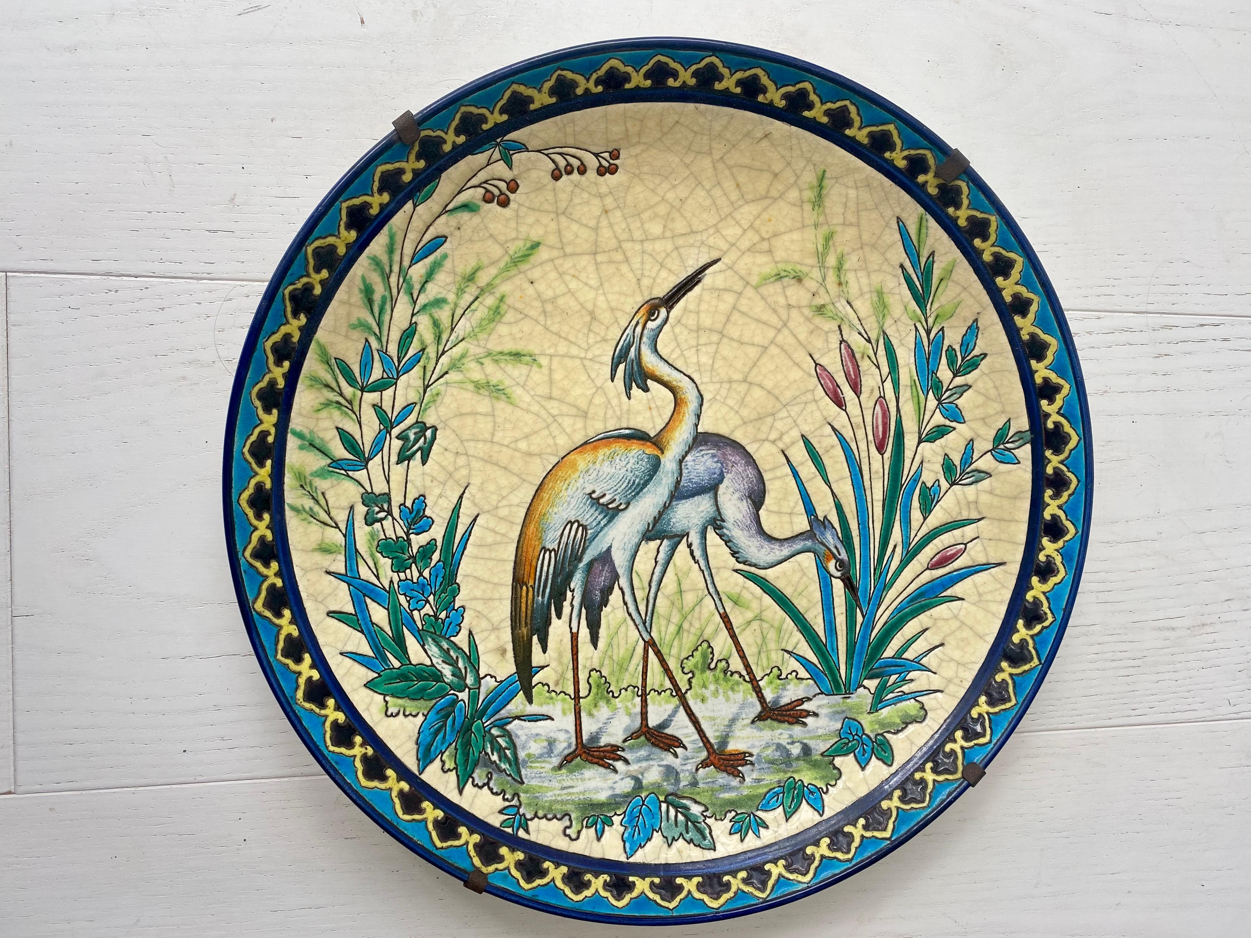 An stunning antique LONGWY decorative plate 

An early example with stamps to back

Beautiful vibrant colours.
No visible cracks or chips, marks commensurate with age.

31cm in diameter.
