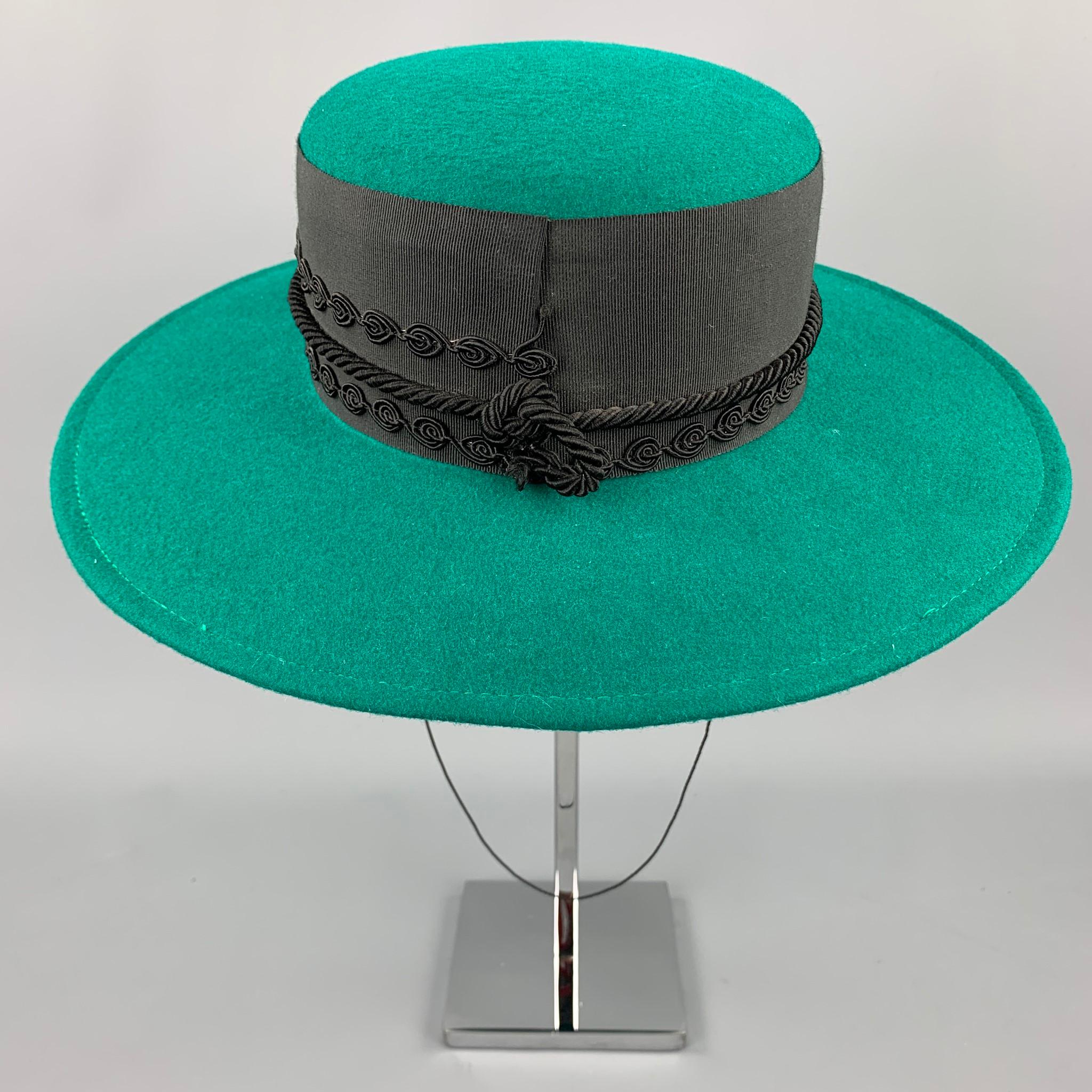 black top hat with green ribbon