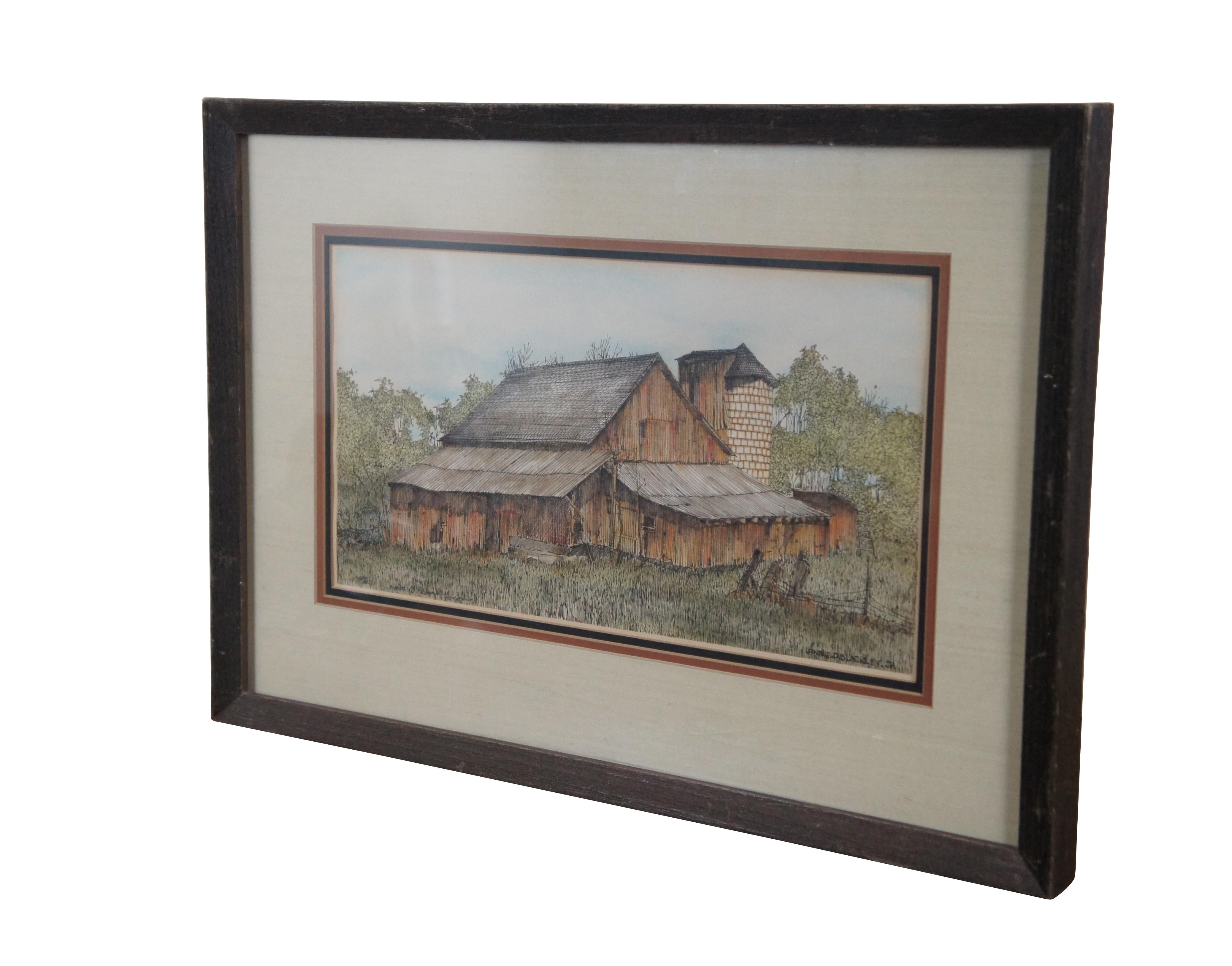 A beautiful hand colored lithograph print by Lonnie C. Blackley, Jr, showing a large, red, dilapidated barn and silo in a country farmhouse landscape  Pencil signed and numbered 17/25 in lower left. Rustic wood frame, black, red, and white triple