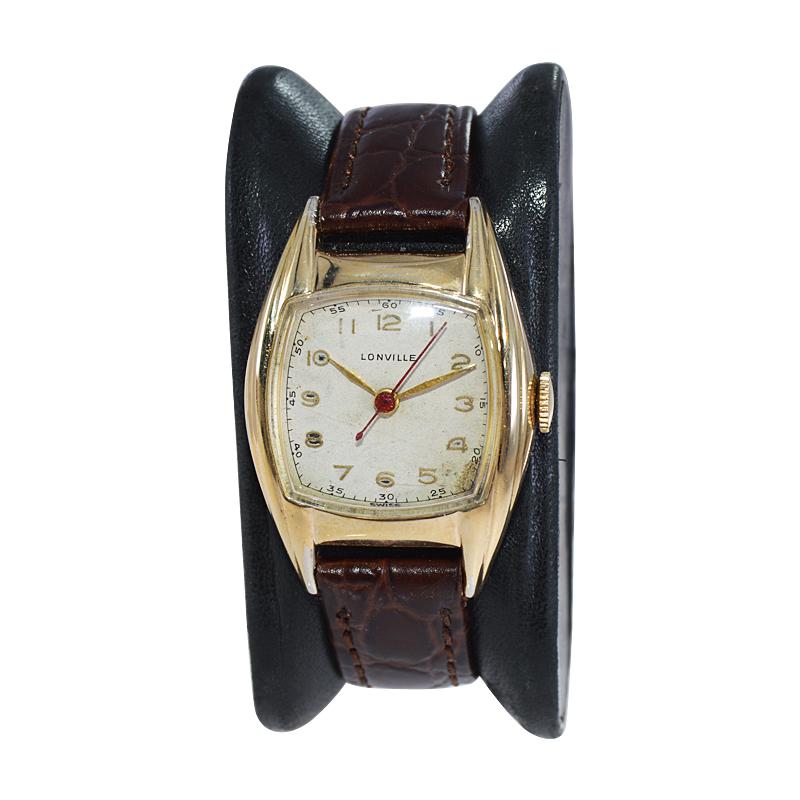 FACTORY / HOUSE: Lonville Watch Company
STYLE / REFERENCE: Art Deco / Tonneau Shape
METAL / MATERIAL: Yellow Gold Filled
CIRCA / YEAR: 1940's
DIMENSIONS / SIZE: Length 38mm x Diameter 28mm
MOVEMENT / CALIBER: Manual Winding / 7 Jewels /