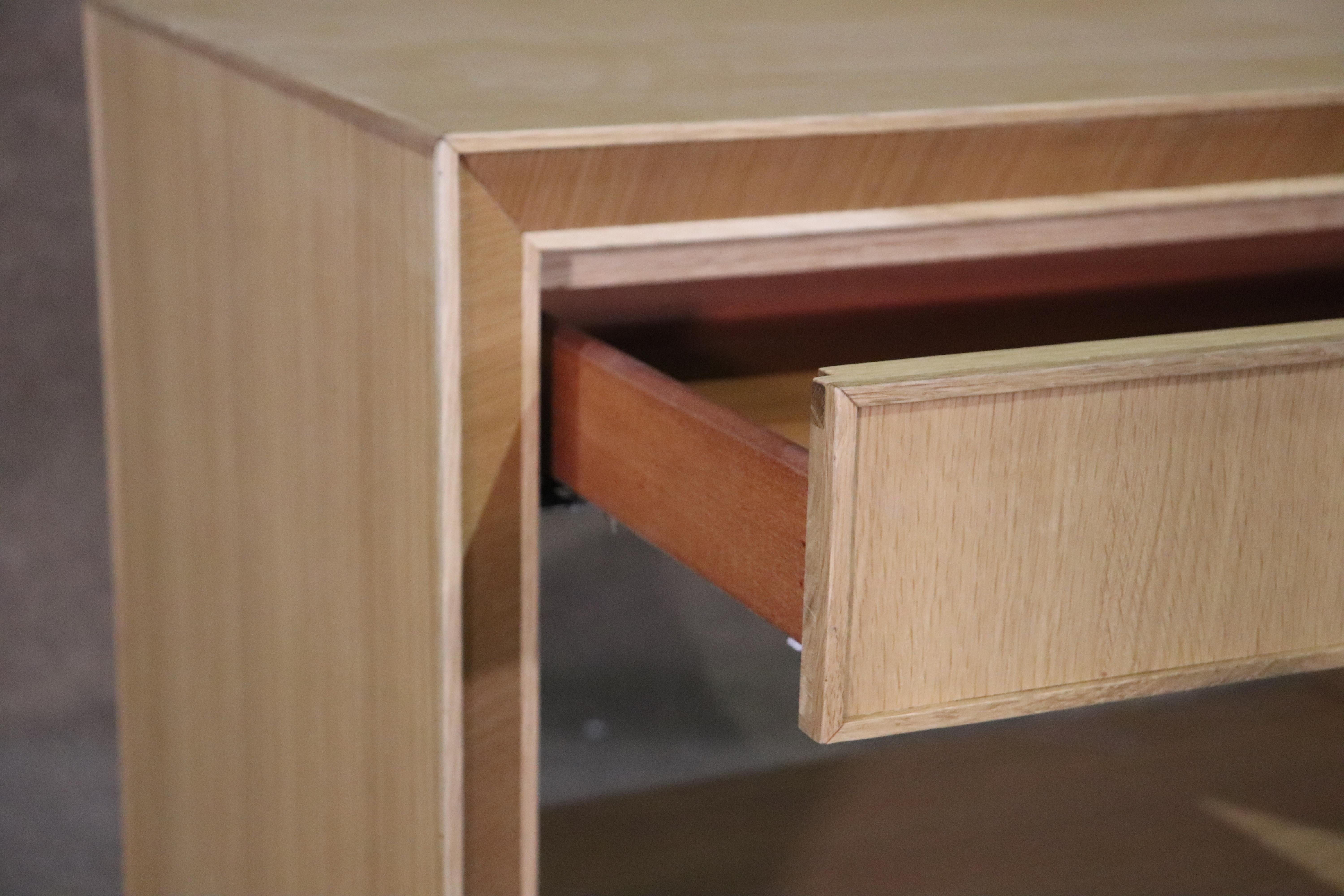Pair of bedside tables with drawer and open cabinet storage. Beveled edges give these square tables dimension.
Please confirm location NY or NJ