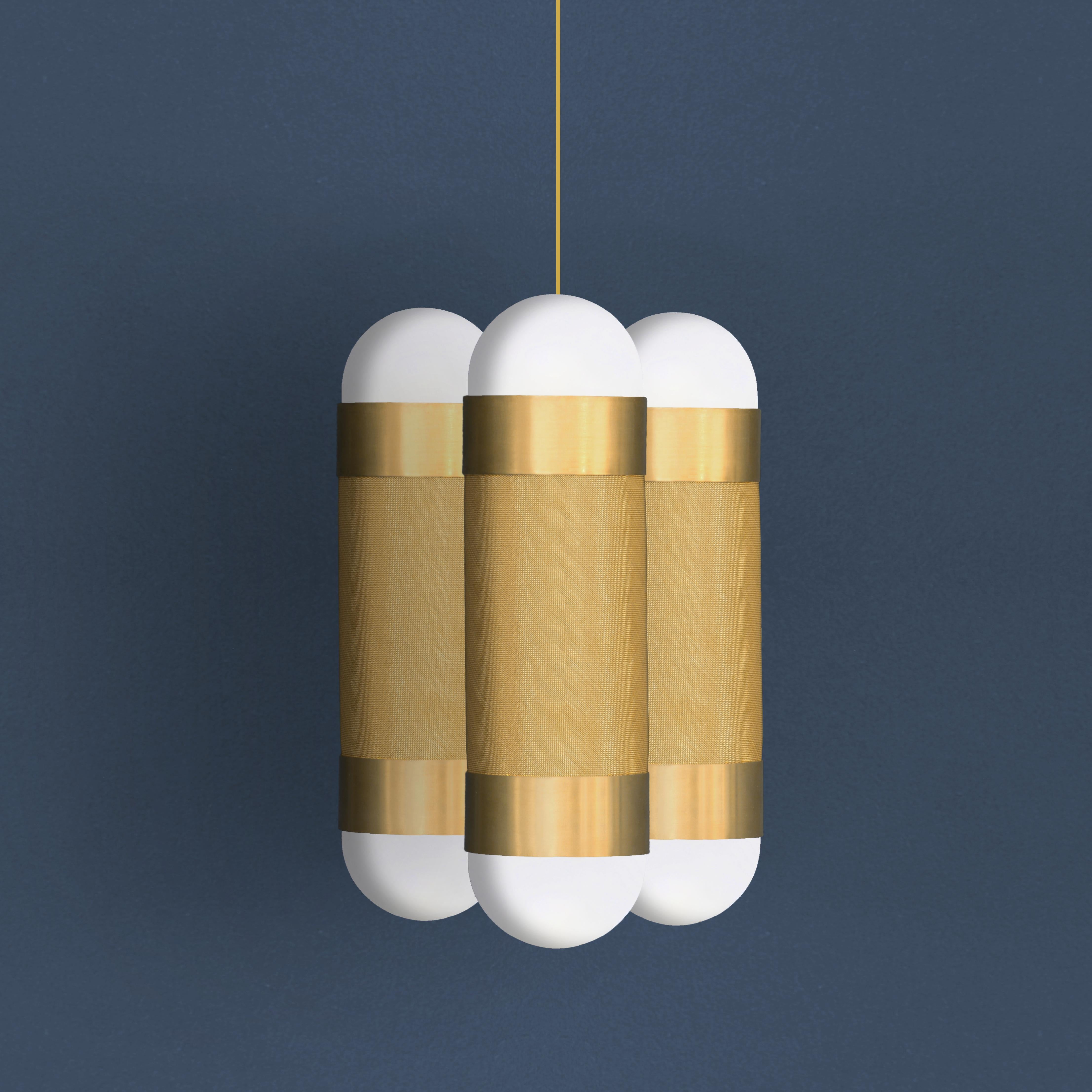 The LOOM cluster light is defined by its signature woven brass cylinders topped with hand-brushed brass sleeves and completed with soft-white borosilicate glass domes, all beautifully nestled together. 

When illuminated the LOOM emanates a soft,