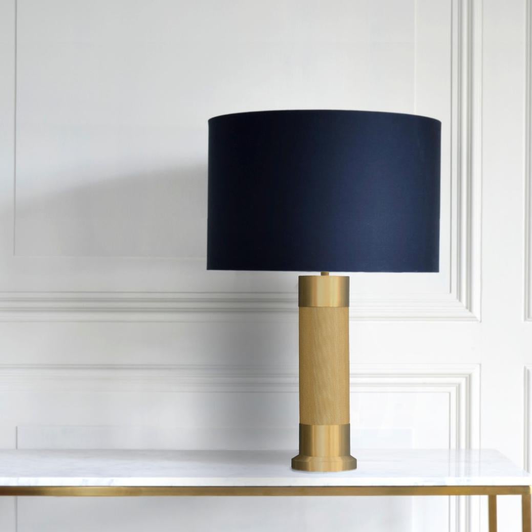 Introducing the LOOM table lamp, part of the new LOOM collection. The textured woven brass is beautifully wrapped around the cylindrical base and completed with brass sleeves. 

This table lamp adds elegance and beauty to any side or console