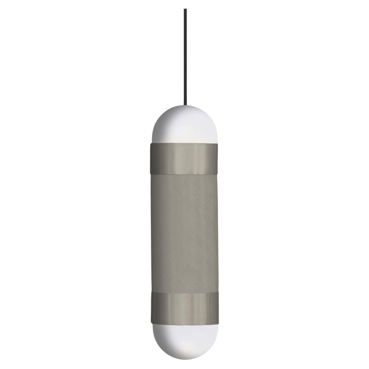The LOOM pendant light is defined by its signature woven nickel cylinder topped with hand-brushed nickel sleeves and completed with soft-white borosilicate glass domes. When illuminated the LOOM emanates a soft, warm glow through the nickel weave,