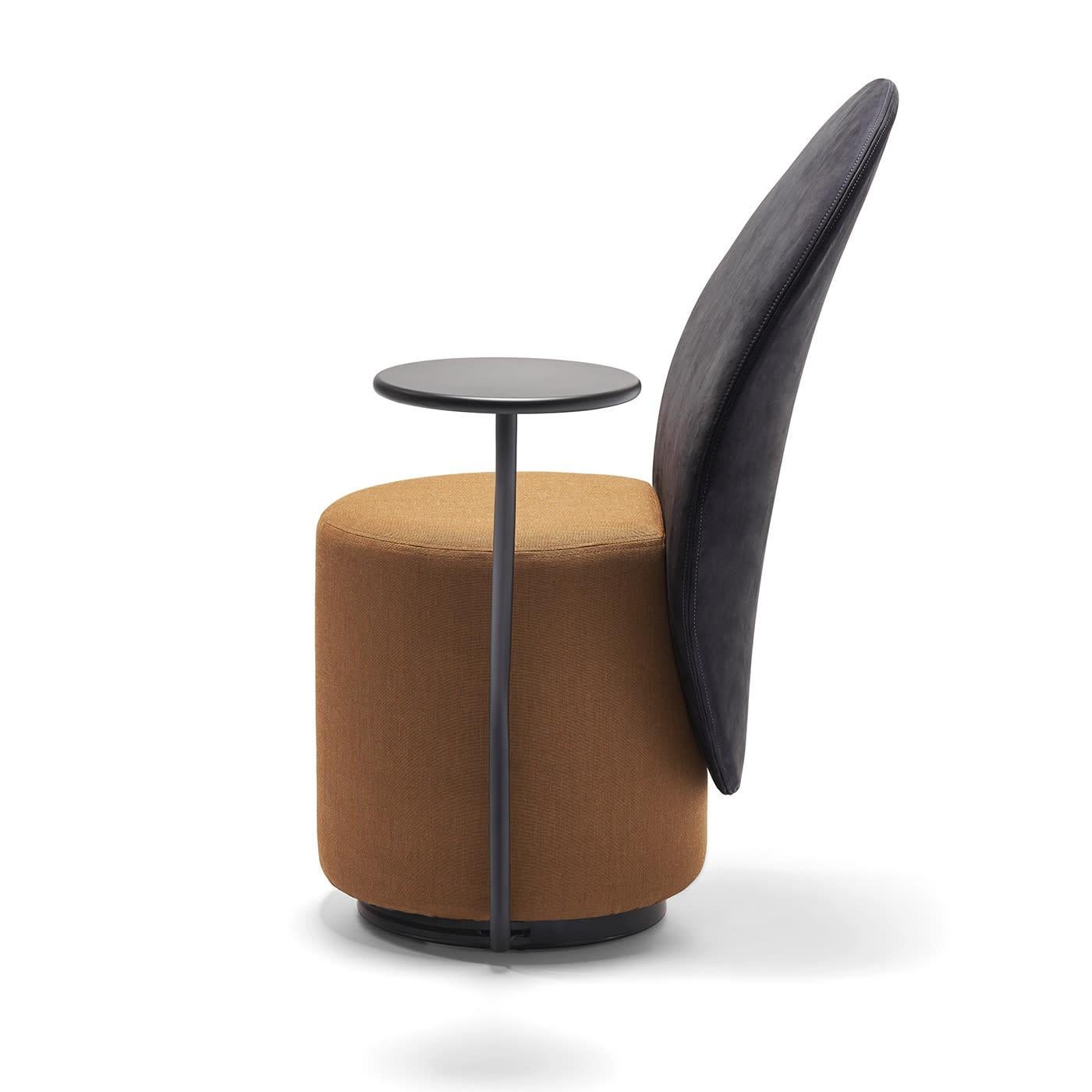 Comfort, multi-functionality, and pleasant aesthetic effortlessly merge in this stunning chair, designed by Lapo Ciatti to offer the plush experience of a padded armchair in a compact shape. A sculpted, cylindrical element - pivoting up to 180° -