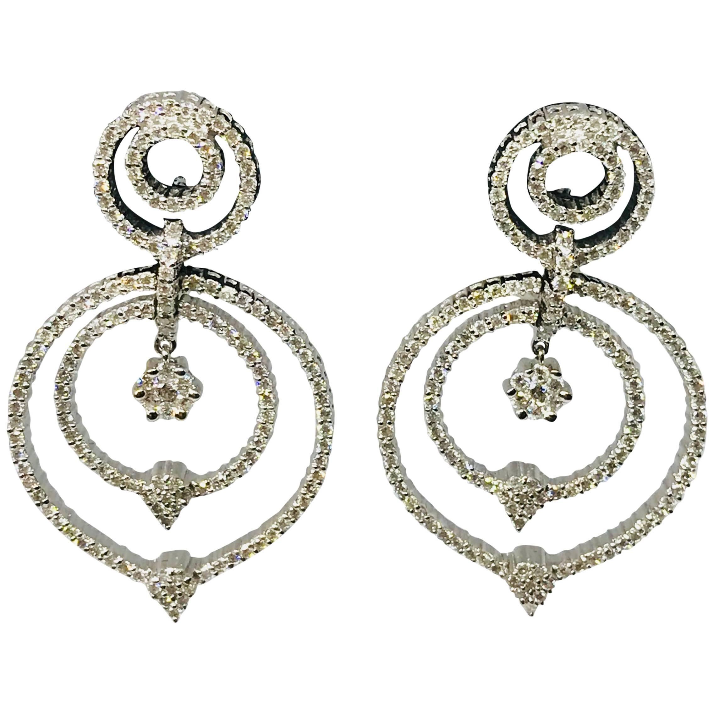 Loop Dangle Earring with 18 Karat White Gold 15.5 grams and 7 Cts Diamonds For Sale