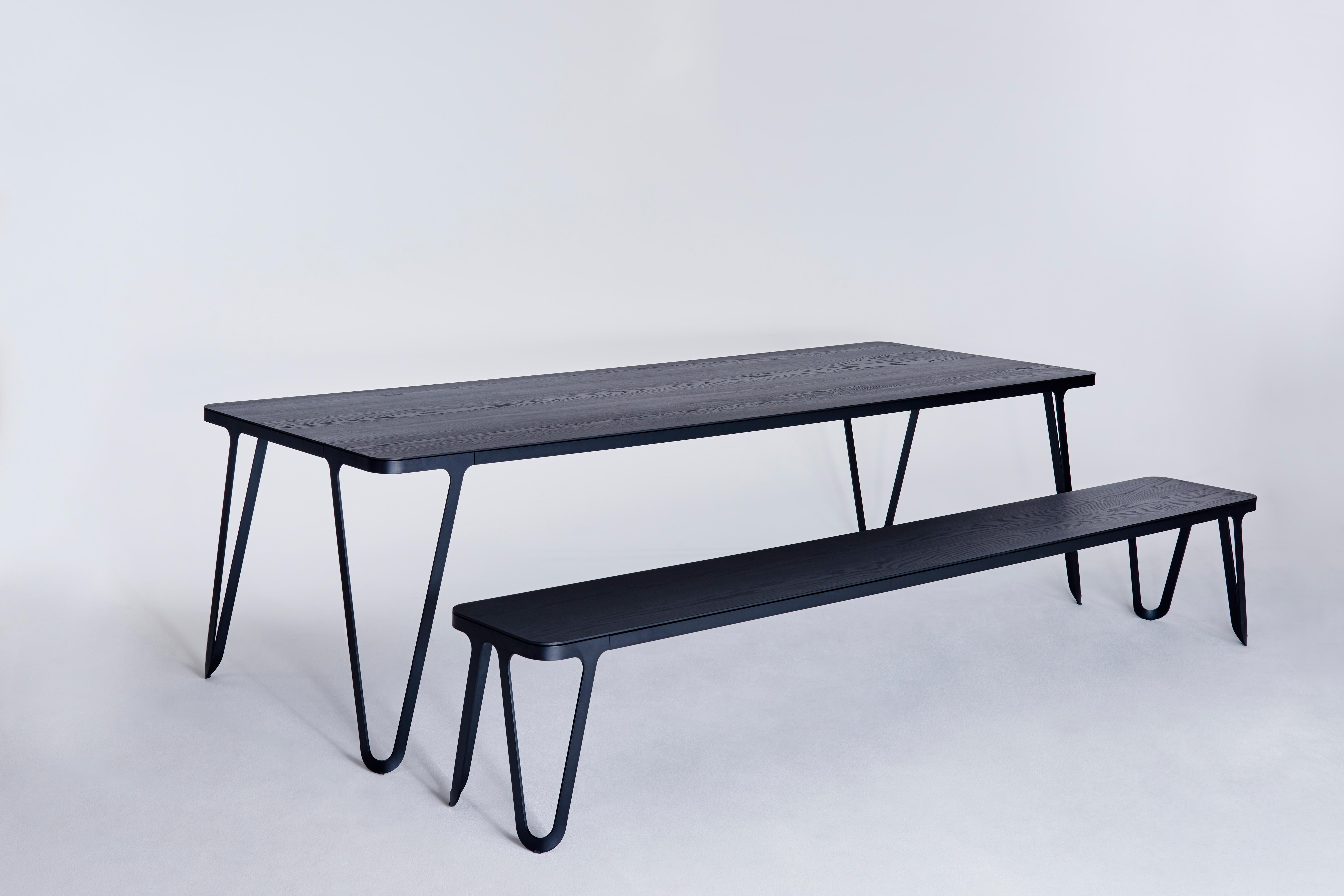 Loop table 160 ash by Sebastian Scherer.
Dimensions: D 160 x W 90 x H 74 cm.
Materials: Oak, Aluminium, wood.
Weight: 47.1 kg.
Also available: Colours:Solid wood (matt lacquered or oiled): black and white stained ash / natural oak / american