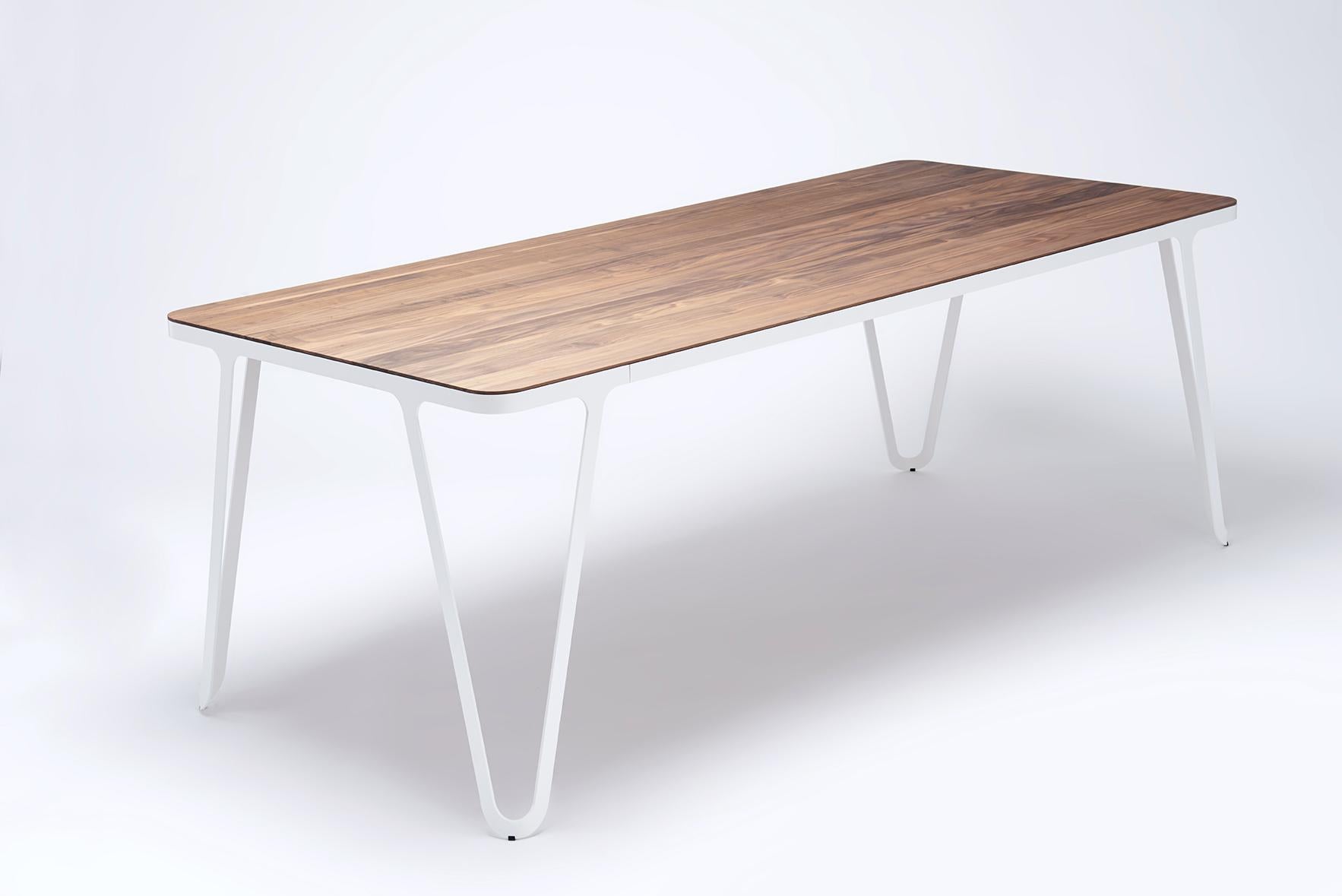 Loop table 200 Ash by Sebastian Scherer.
Dimensions: D200 x W90 x H74 cm.
Materials: Ash, Aluminium, Wood.
Weight: 57.8 kg.
Also Available: Colours:Solid wood (matt lacquered or oiled): black and white stained ash / natural oak / american