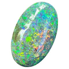 Raro opale nero australiano da 8ct e 2,50ct. Anello con diamante