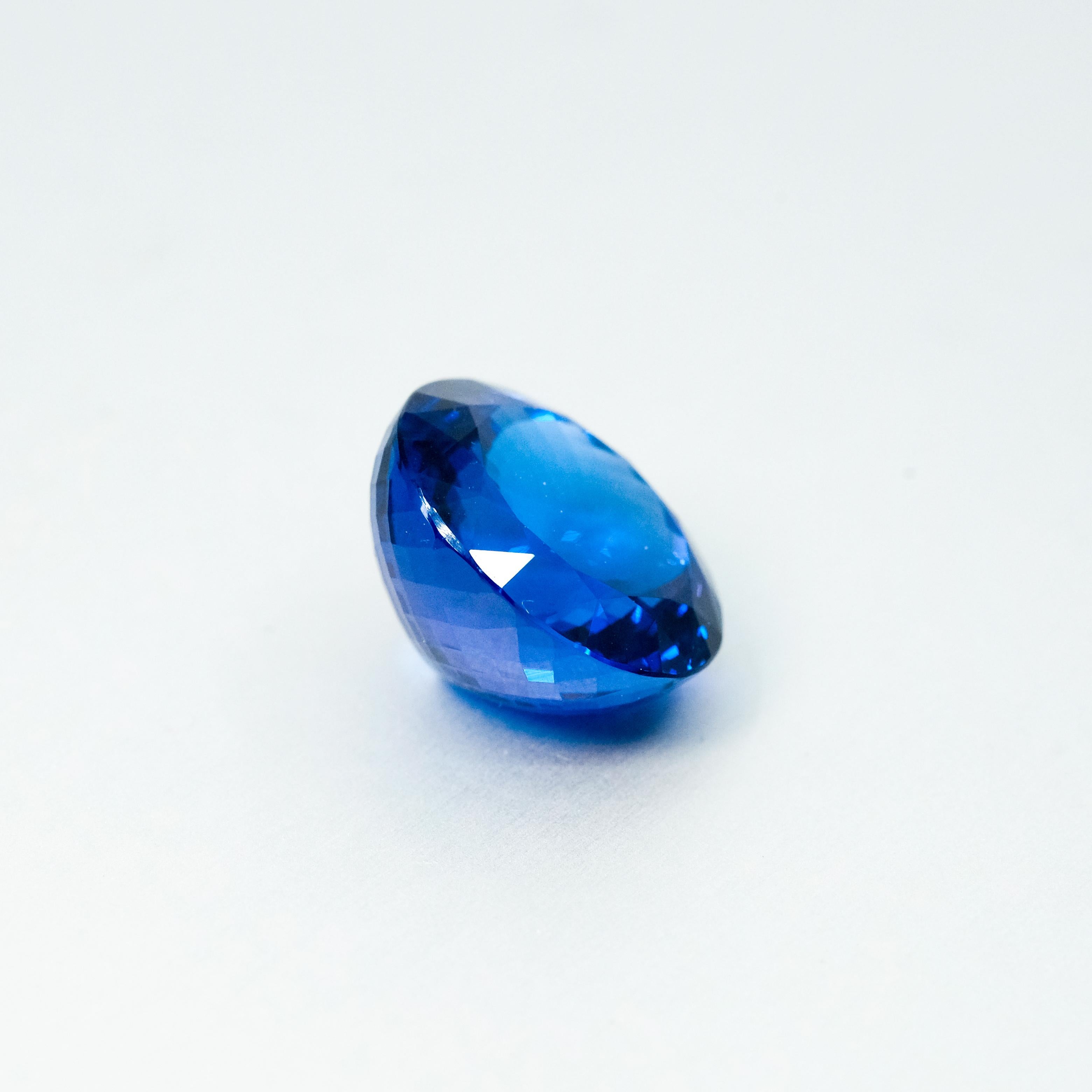 A round brilliant cut Tanzanite, of 30.96ct. 
With GSL certificate. 

This stone is available to be set into the piece of your choice or kept to be admired on its own.