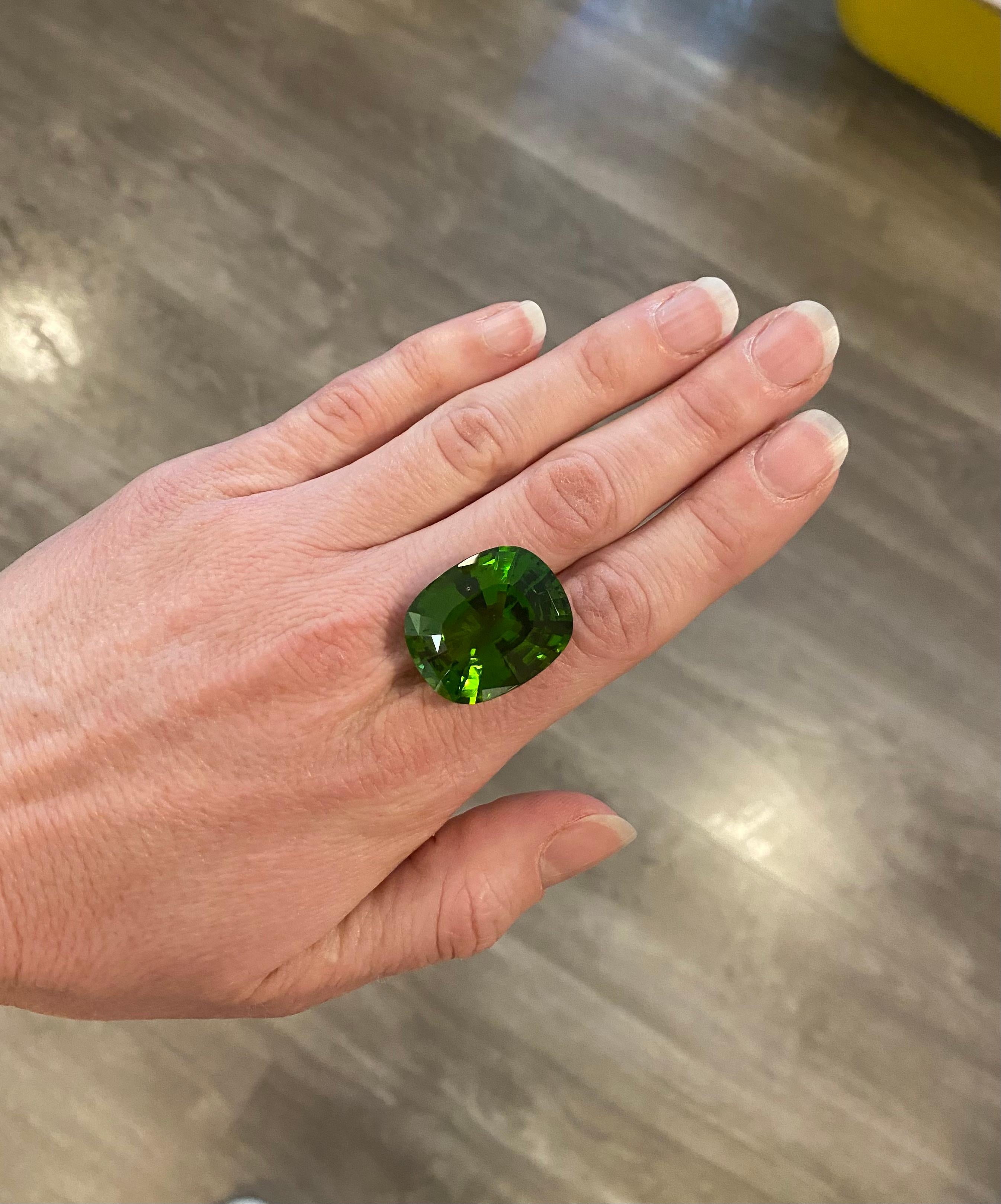 A beautiful peridot of a rare size of 52.69ct. This stone can be made into a stunning piece of jewellery by our artisans in Geneva. 
