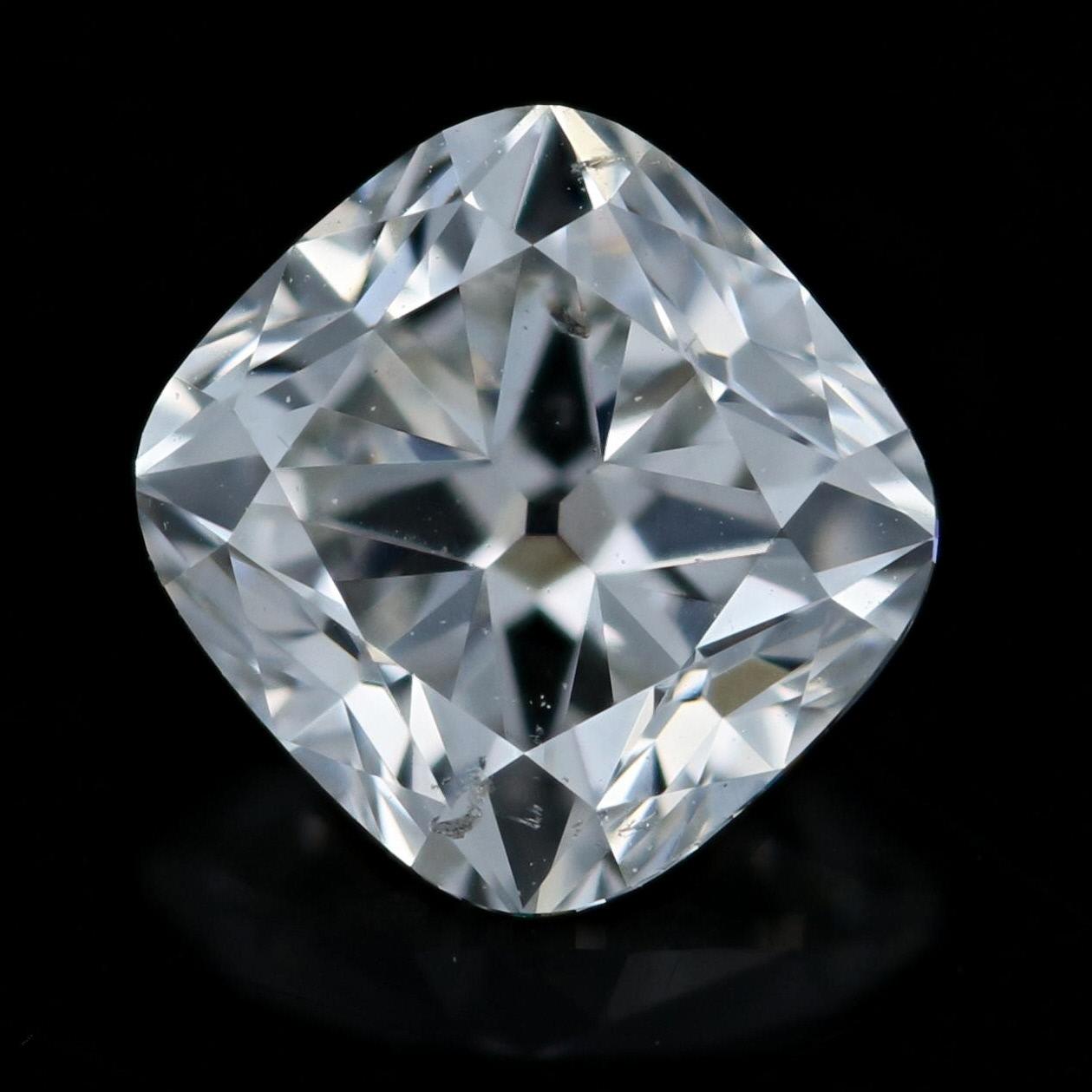 Weight: .91ct
Cut: Cushion 
Color: H   
Clarity: SI2 
Dimensions (mm): 5.62 x 5.42 x 3.75 

GIA Report Number: 6107507189 

Condition: New  

Please check out the enlarged pictures.

Thank you for taking the time to read our description. If you have