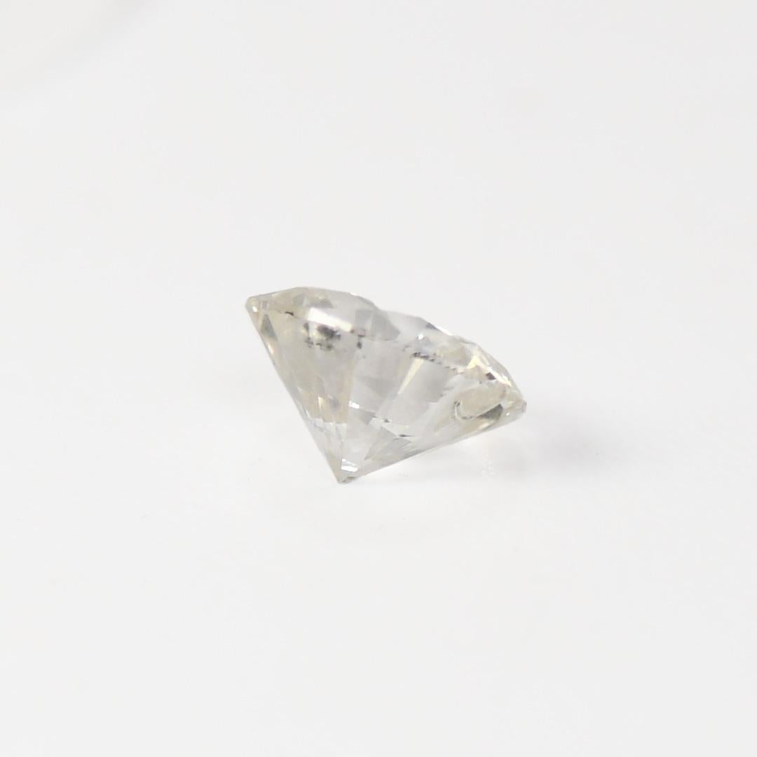 Loose round brilliant diamond, 1.26 carats.
No grading lab certificate.
H to I color, i1 -i2 clarity, good symmetry, and very brilliant.
Magnification is needed to see any natural inclusion.
The diamond looks white when viewed face up.
Graded by our
