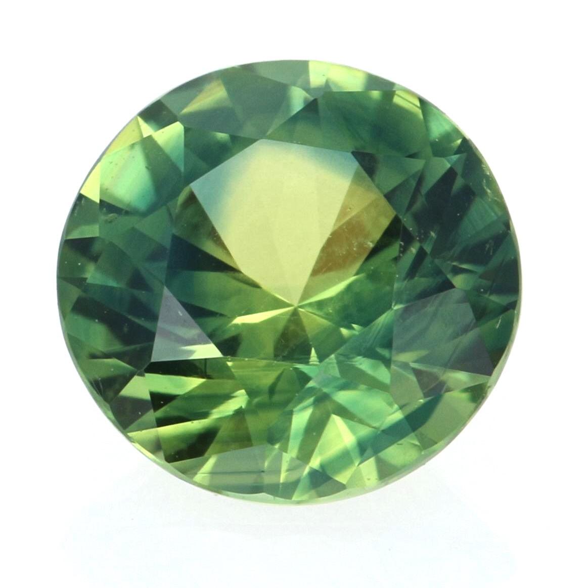 Weight: 1.45ct
Treatment: Heating
Cut: Round Brilliant 
Color: Bluish Yellowish Green   
Dimensions (mm): 6.80 - 6.71 x 4.32 

AGL Report Number: GB 1102499 

Condition: New  

Please check out the enlarged pictures.

Thank you for taking the time