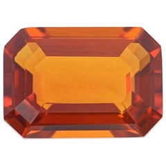 Loose Spessartite Garnet, Emerald Cut .84 Carat Reddish Orange Solitaire