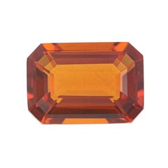 Loose Spessartite Garnet, Emerald Cut .84 Carat Reddish Orange Solitaire