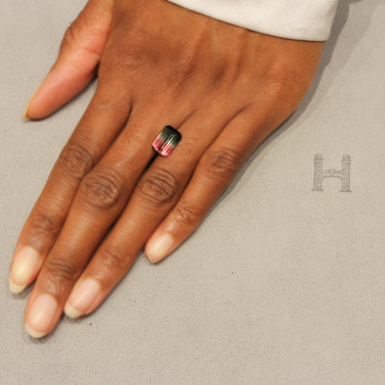 A stunning 3.45 carat bicolour emerald cut watermelon tourmaline from Brazil. This incredible gem features a perfect 50% / 50% colour split between green and pink. 

We have specialised in handmade, one-of-a-kind pieces of jewellery since 1980. All
