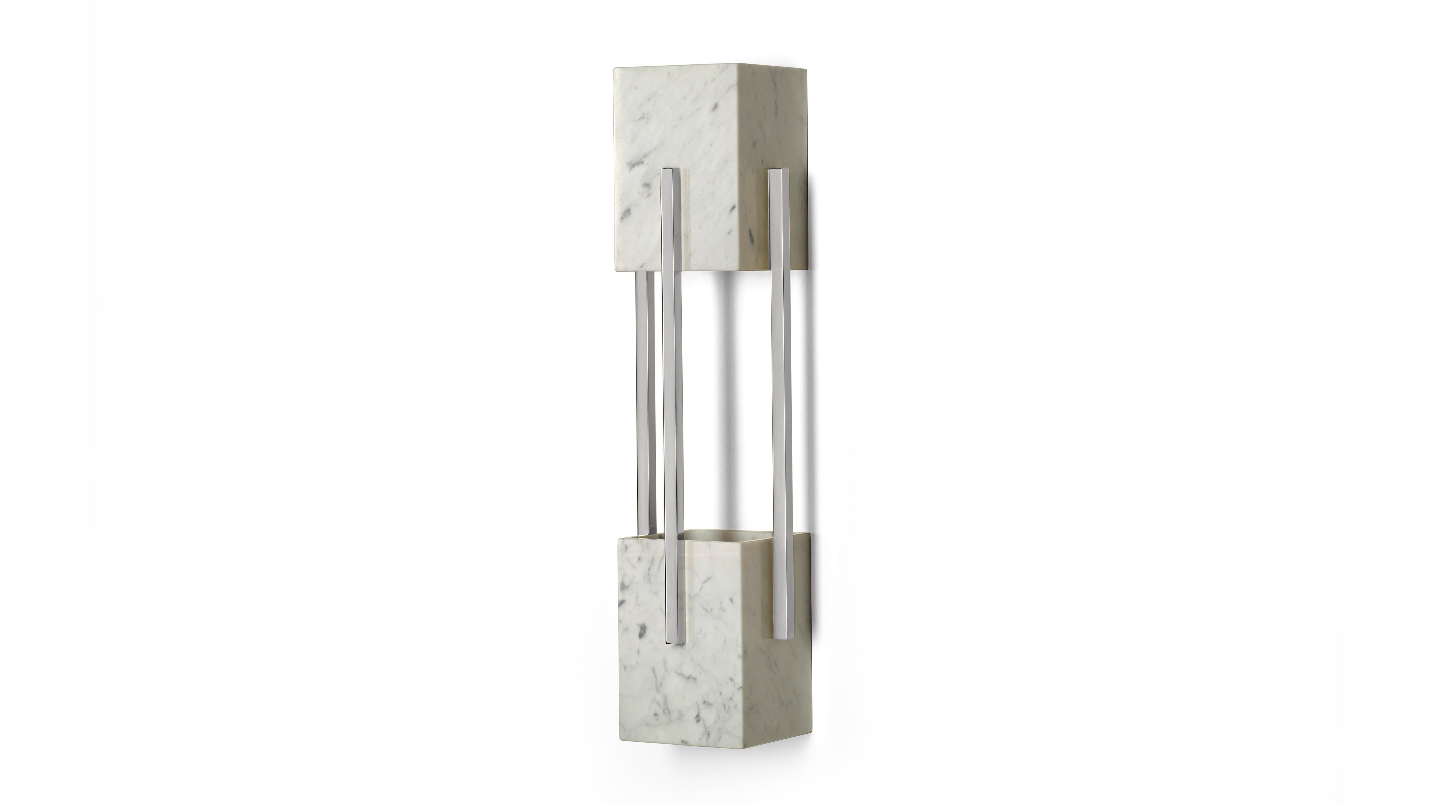Looshaus Carrara Marble and Nickel Wall Lamp by InsidherLand
Dimensions: D 13 x W 14 x H 56 cm.
Materials: Carrara marble, polished nickel.
3.5 kg.
Available in other marbles and metals.

The Looshaus building by Architect Adolf Loos in Vienna