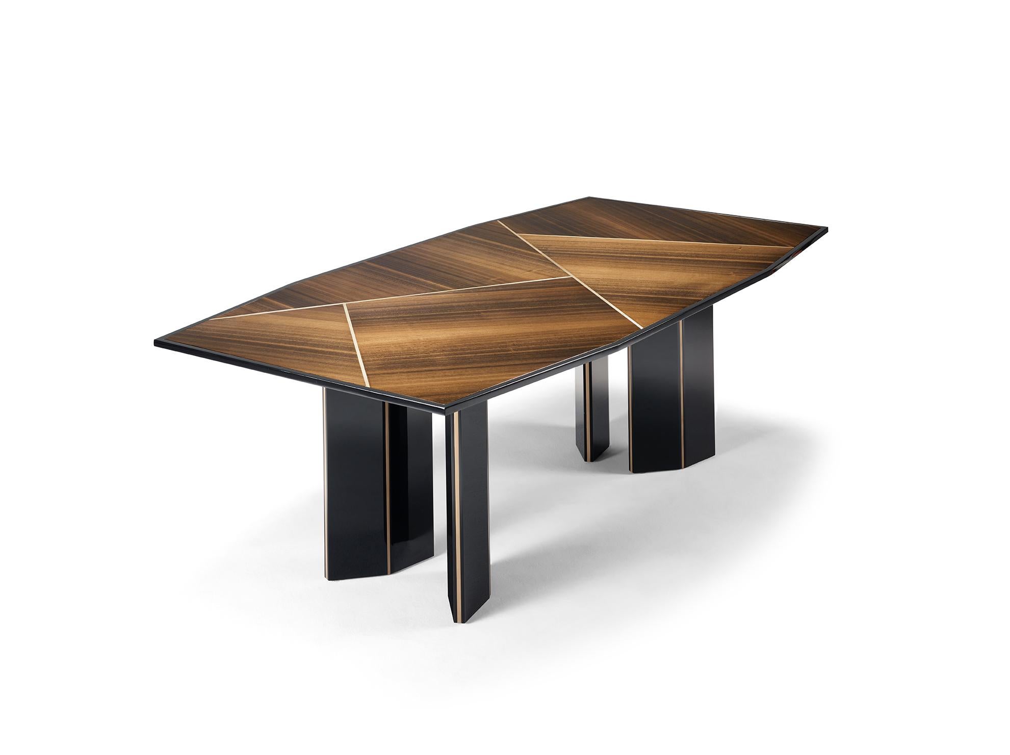 The LORCA Dining Table is a game of shapes between the legs and the top, not obeying the straight lines. The refined inlaid detail confines the division to the table top, allowing customization and creativity with our range of lacquer colors and