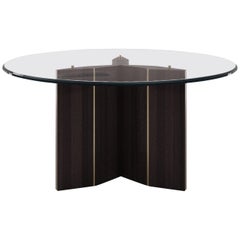 Lorca round dining table with Tempered Glass top and brass lacquer details