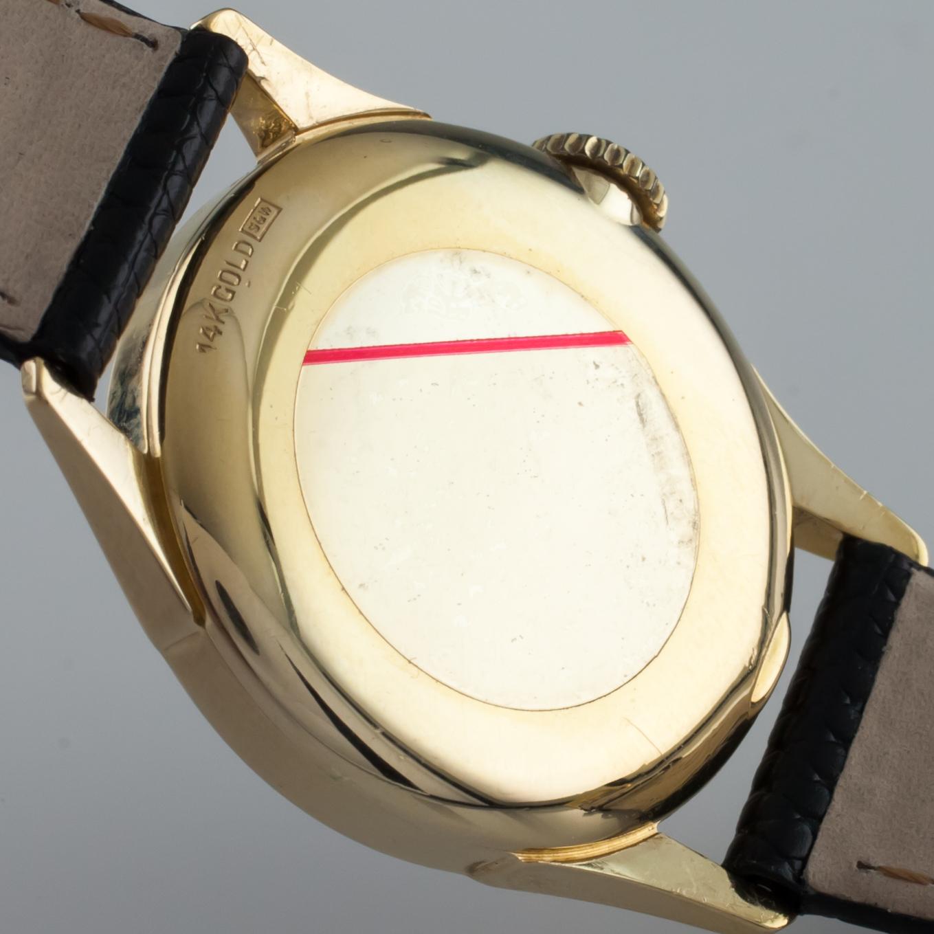 Reloj de cuerda manual Lord Elgin Vintage de oro amarillo de 14 quilates Esfera negra 1953 Mov #556 Moderno en venta