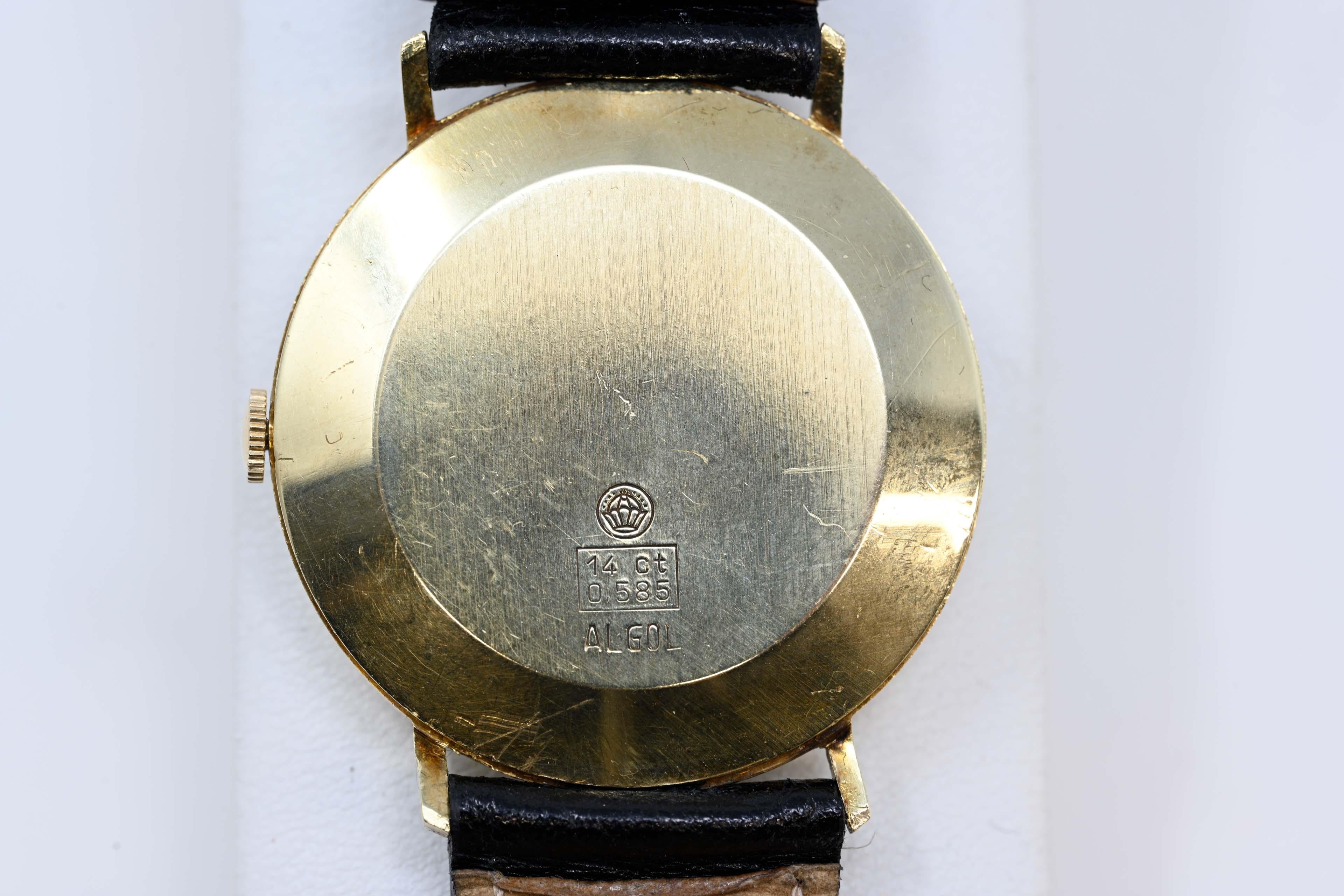 Lord Norle 14k gold men's watch mechanical movement, manual winding , Swiss made circa 
1960-70. 
21 jewel case measures 33.5 mm, leather strap. In working order, minor chip on the crystal.