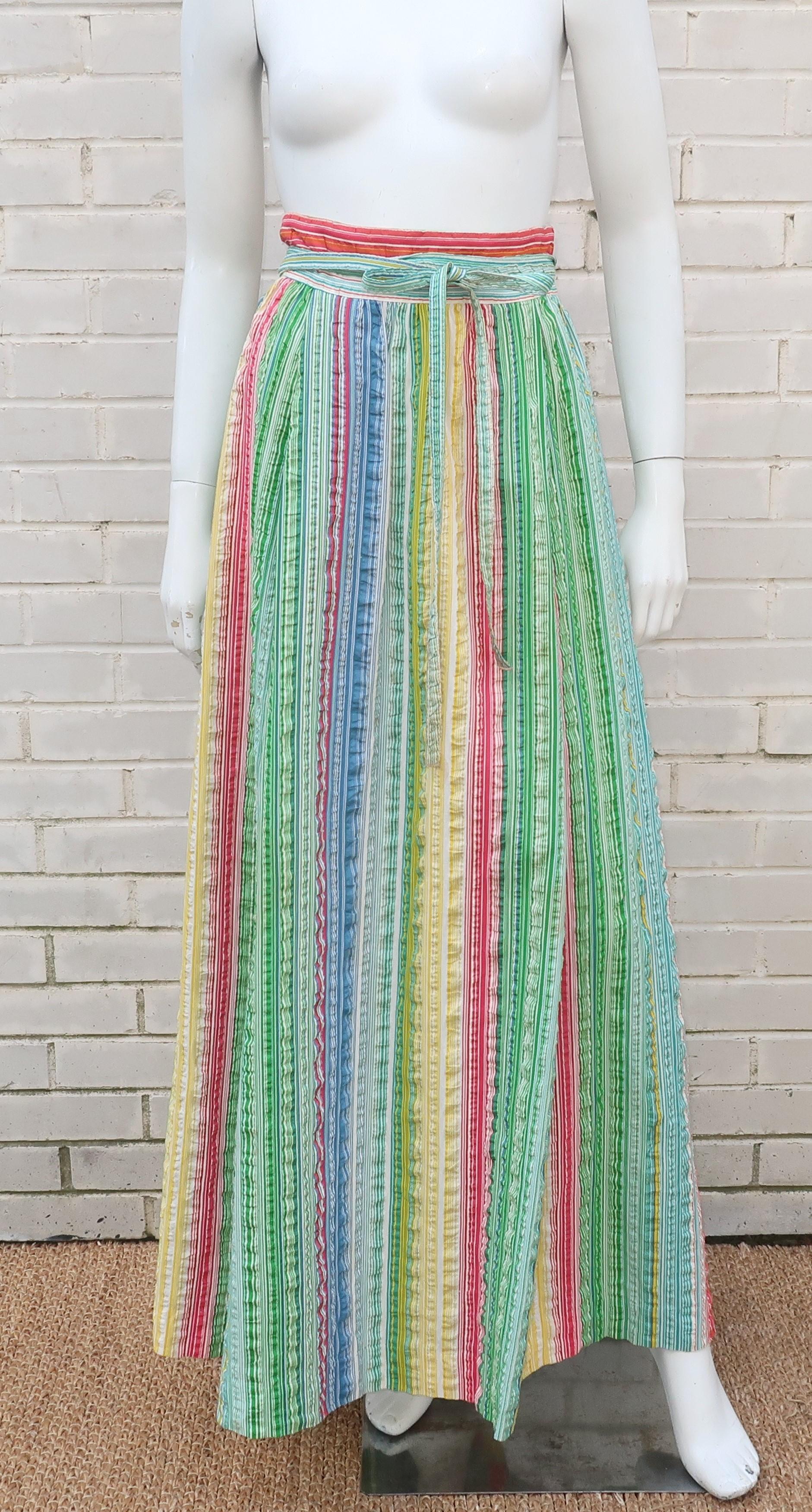 Seersucker was made for Summer!  This adorable striped seersucker maxi skirt wraps and ties for an easy breezy look to pair with t-shirts, halter tops or an alternative to a bathing suit cover-up.  The primary colors include blue, yellow, green and