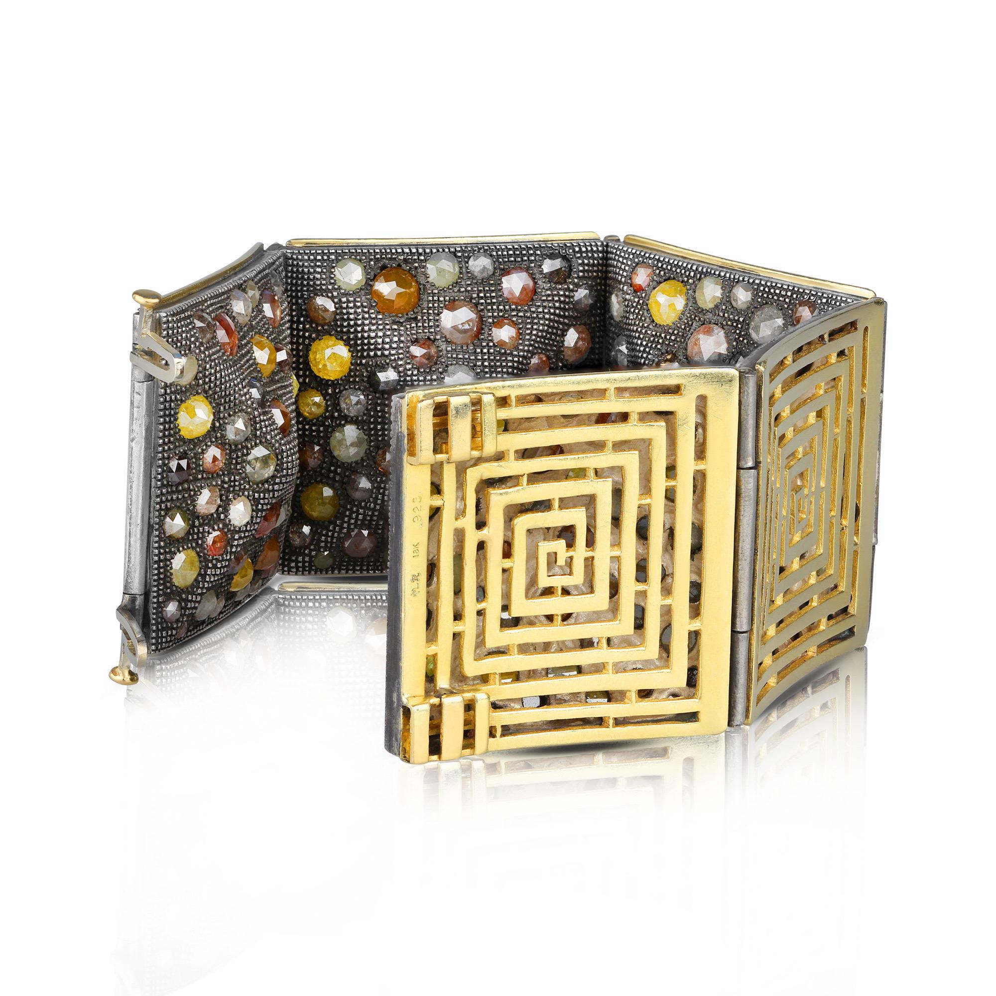 Maker: Loree Rodkin

Era: Late 2000s

Composition: 18K Yellow Gold and Sterling Silver

Primary Stone: Fancy Color Rose Cut Diamonds (Approximately 45 Total Carat Weight)

Size: 8 Inches

Weight:  171.7 Grams





