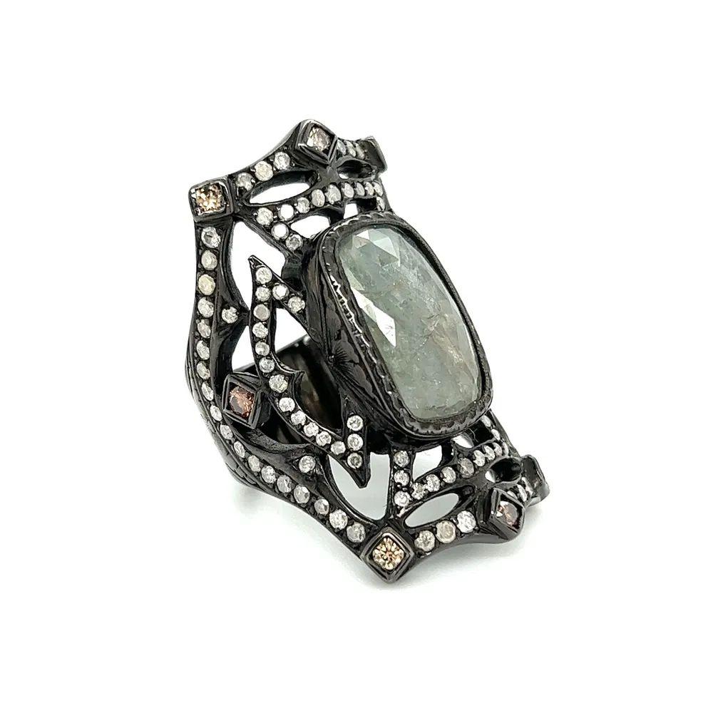 Simply Beautiful! Finely detailed Dynamic Loree Rodkin Designer Black Gold and Diamond Vintage Medieval Solitaire Cocktail Cuff Ring. Centering a Hand set securely nestled 6 Carat Diamond.  Surrounded by 112 Round Diamonds, weighing approx. 1.75tcw