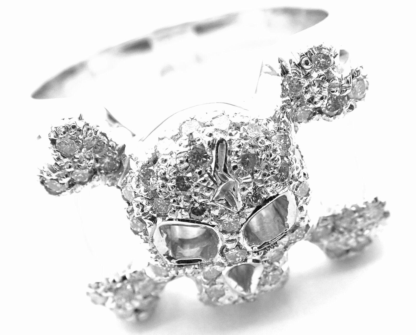 18k White Gold Diamond Skull Crossbones Ring by Loree Rodkin. 
With  50 Round Brilliant cut diamonds G color, VSI clarity total weight approximately .50ctw  
Details: 
Size: 6
Weight: 14.2 grams
Width: 13mm
Stamped Hallmarks: LR 18k
*Free Shipping