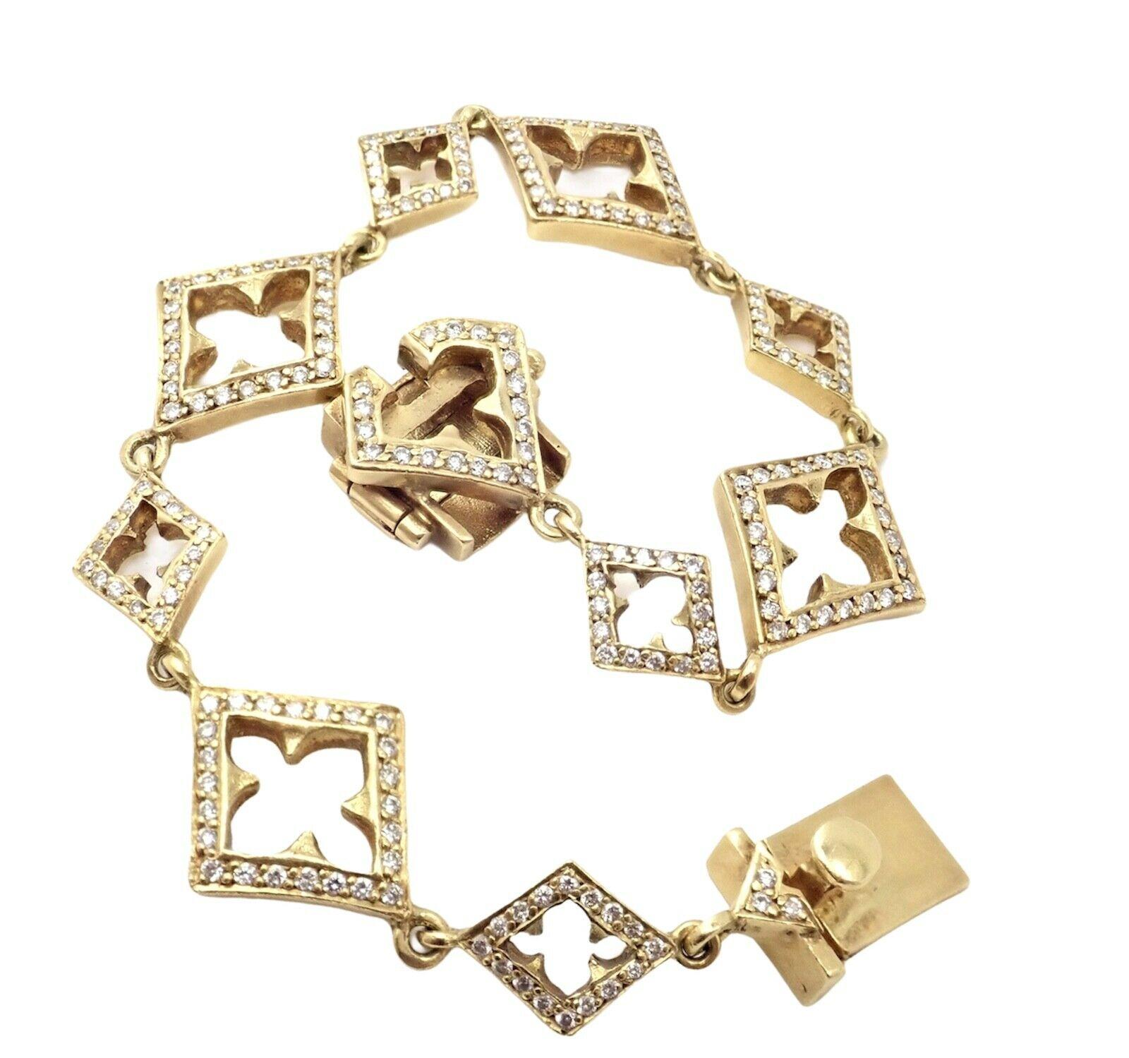 18k Yellow Gold Diamond Cross Bracelet by Loree Rodkin. 
With 200x Round Brilliant cut diamonds F color, VSI clarity total weight approximately 3ctw  
Details: 
Weight: 25.3 grams
Length: Fits 6 3/4