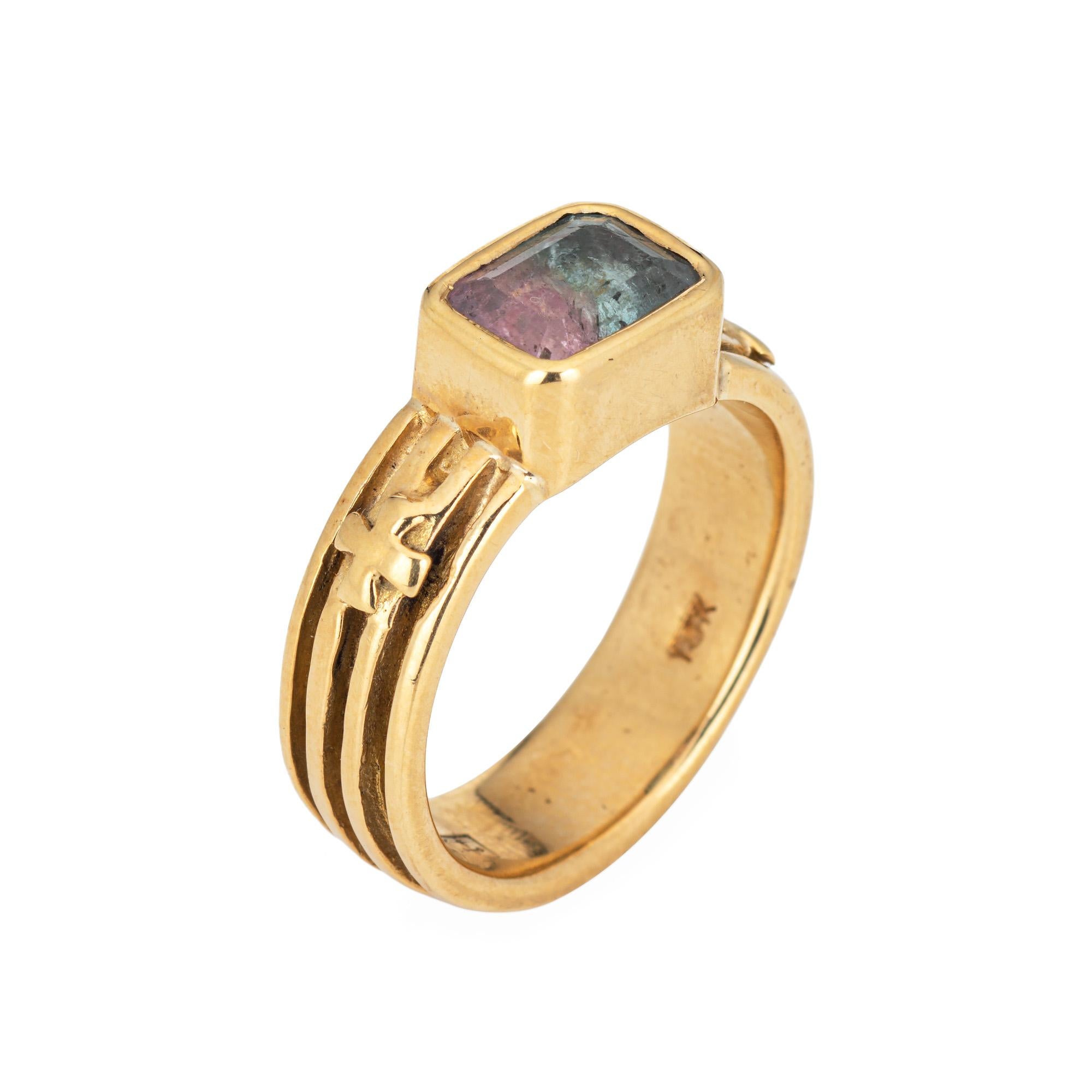 Stylish Loree Rodkin watermelon tourmaline ring, crafted in 18 karat yellow gold. 

Watermelon tourmaline measures 7.5mm x 5.5mm and is estimated at 1.40 carats.

Bezel set in an east to west design, the watermelon tourmaline band is great worn