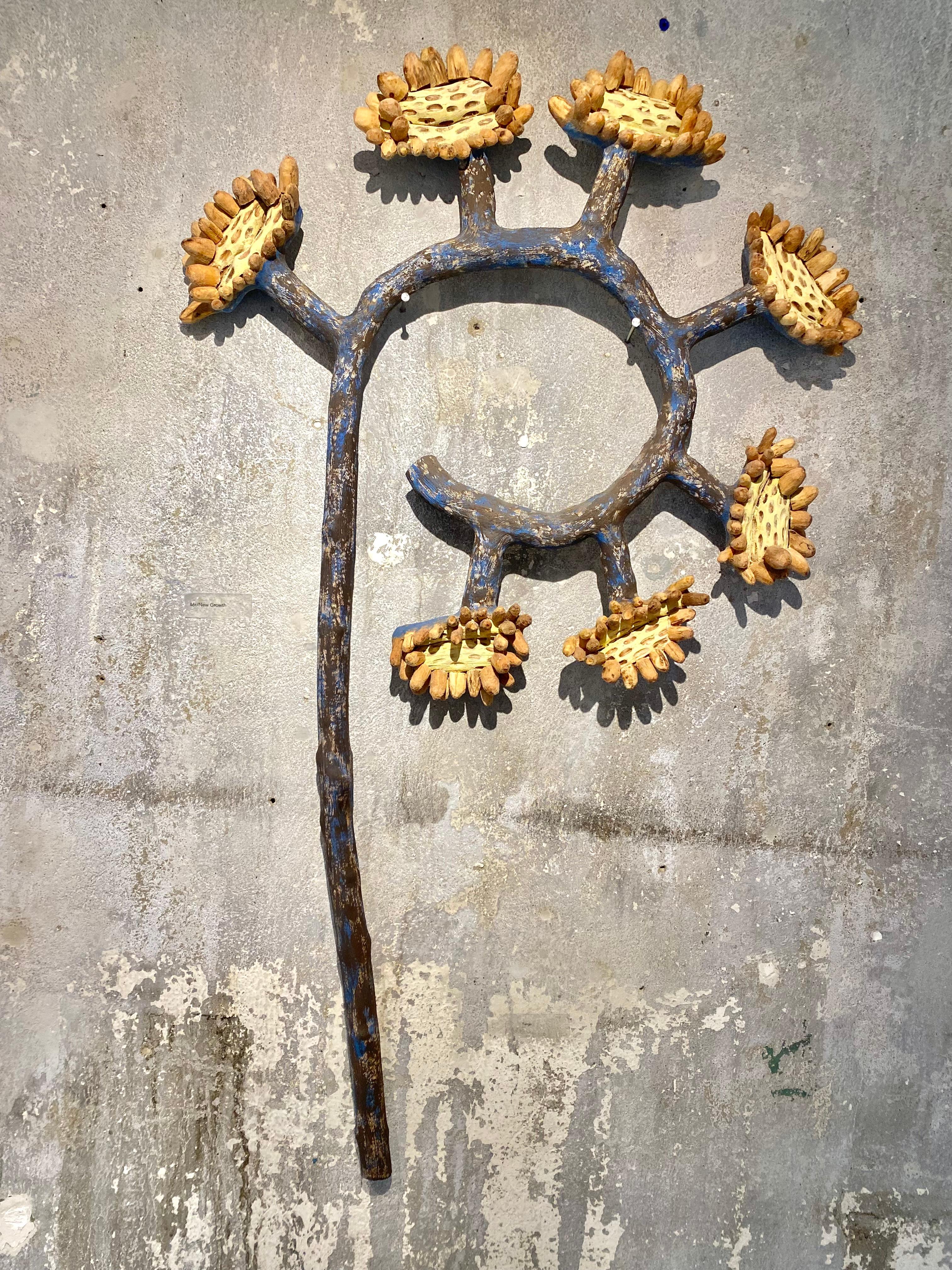 Wall sculpture of sunflower plant: 