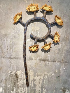 Wall sculpture of sunflower plant: "46r New Growth"