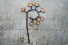 Wall sculpture of sunflower plant: "46r New Growth"