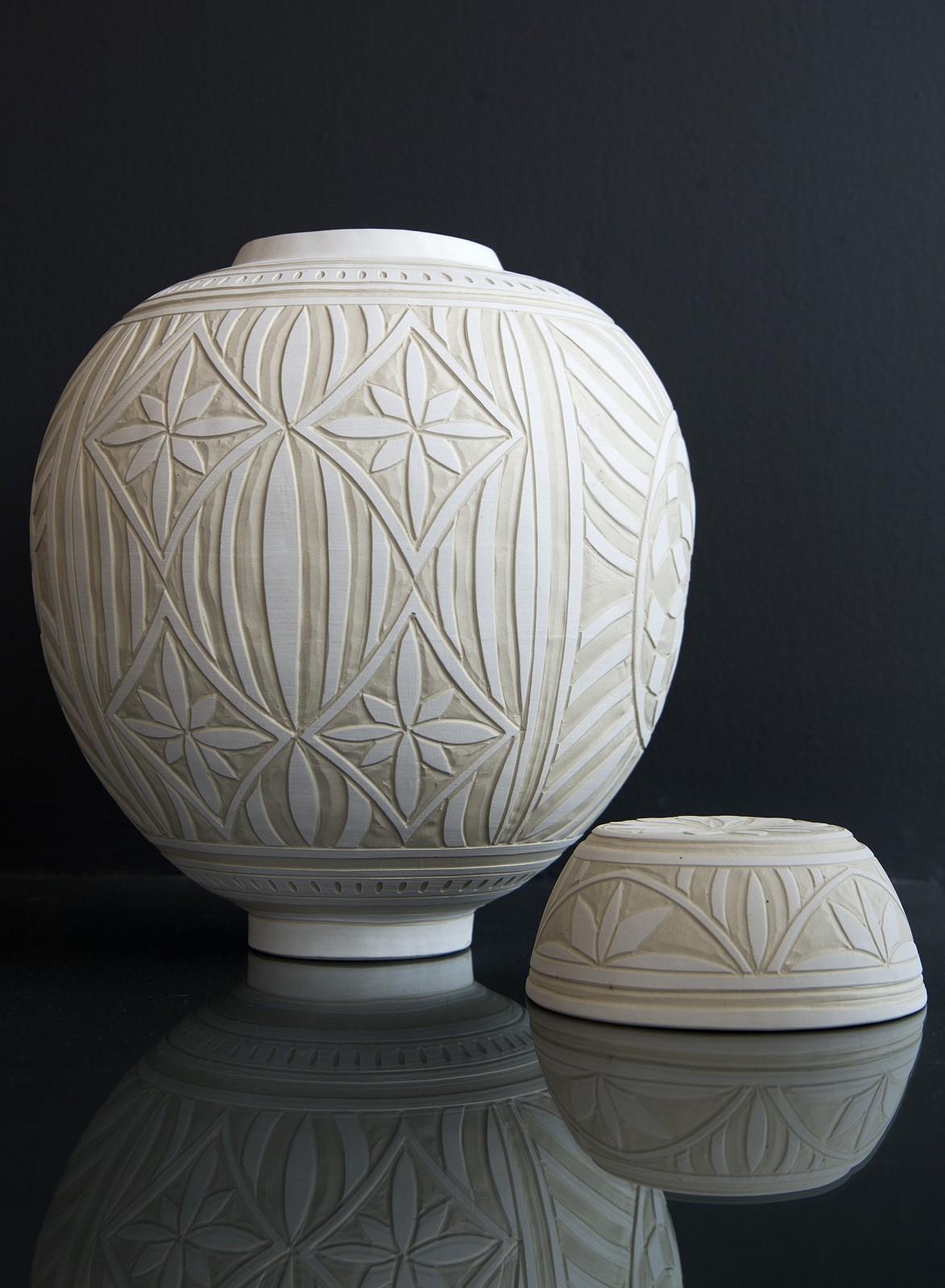 This beautifully detailed medium-sized porcelain vessel was created by ceramicist Loren Kaplan. 

‘Ginger jars’ were first used in China thousands of years ago as a means of storing and shipping precious spices. Ginger became a popular spice in the