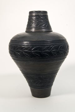 Used Small Black & Umber Ginger Jar with Engraved Leaves - porcelain vessel