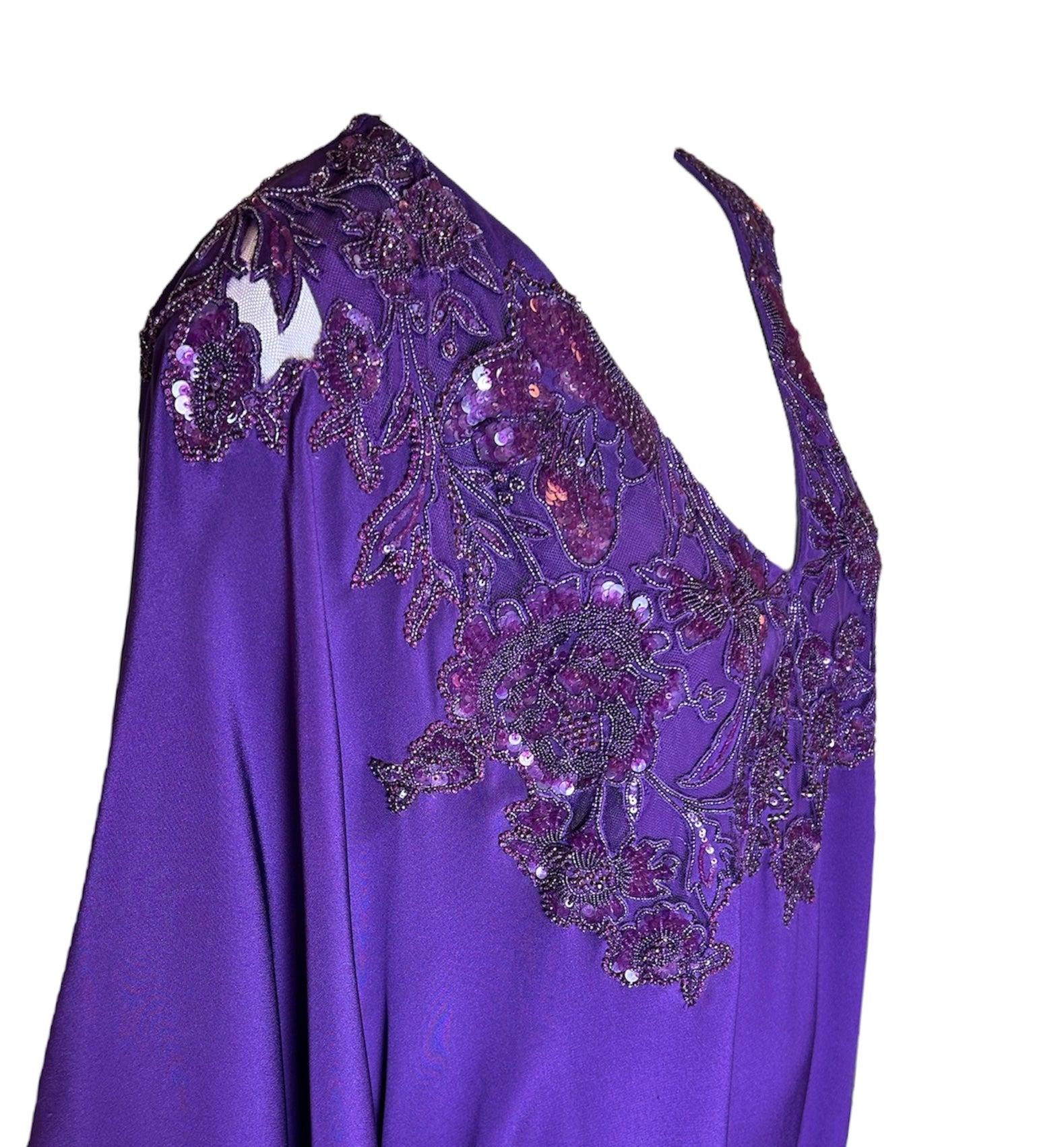 This elegant deep purple Lorena Sarbu caftan is perfect for special occasions. Trimmed in beads, it features exquisite craftsmanship and the highest quality weighted silk, making it ideal for parties, red carpet, and even entertaining at home. Enjoy